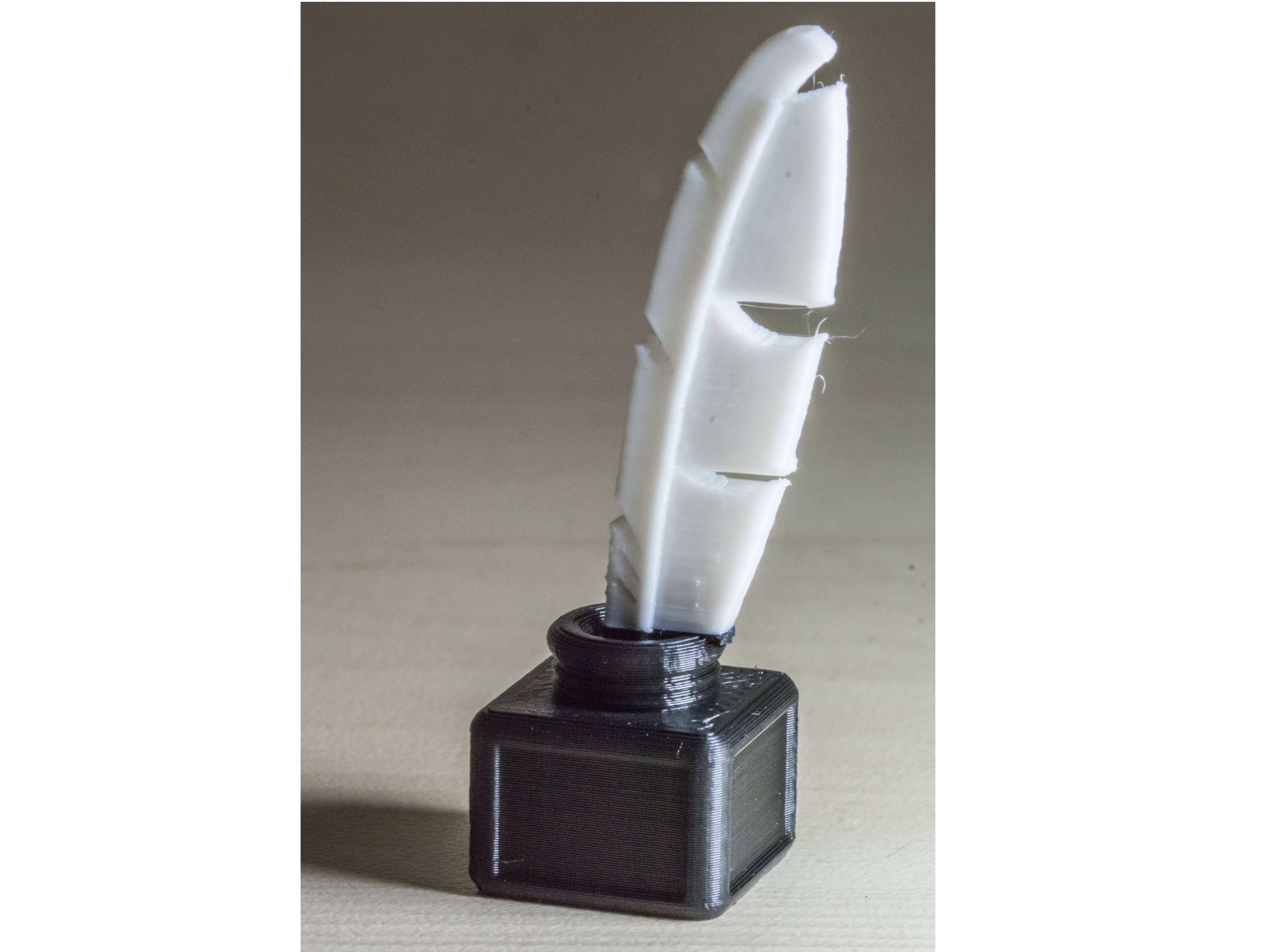 Refrigerator magnet: feather with ink box