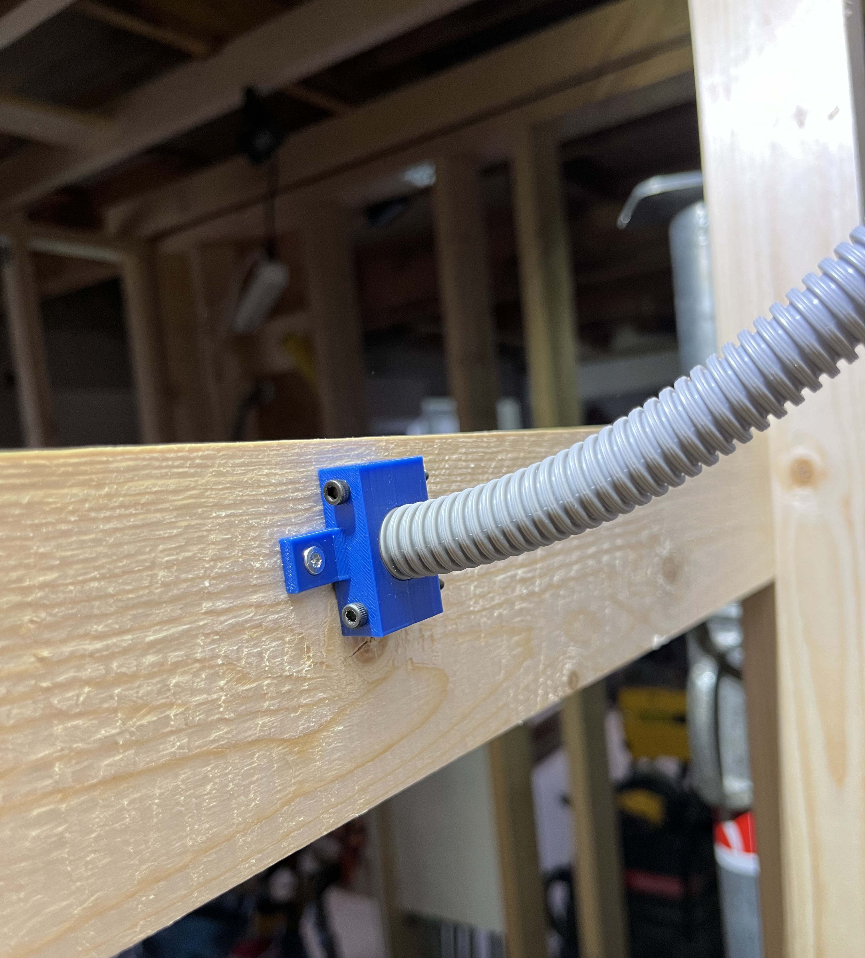 Single and Dual 16mm Conduit Wall-Mount Holders
