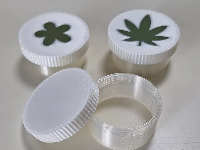 Pill box with twist lid