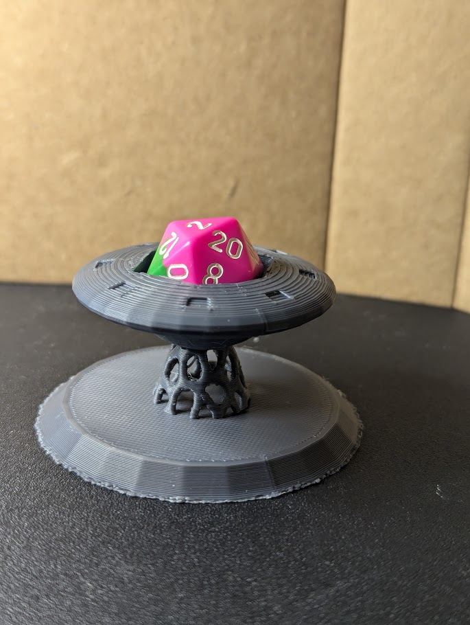 UFO dice guardian