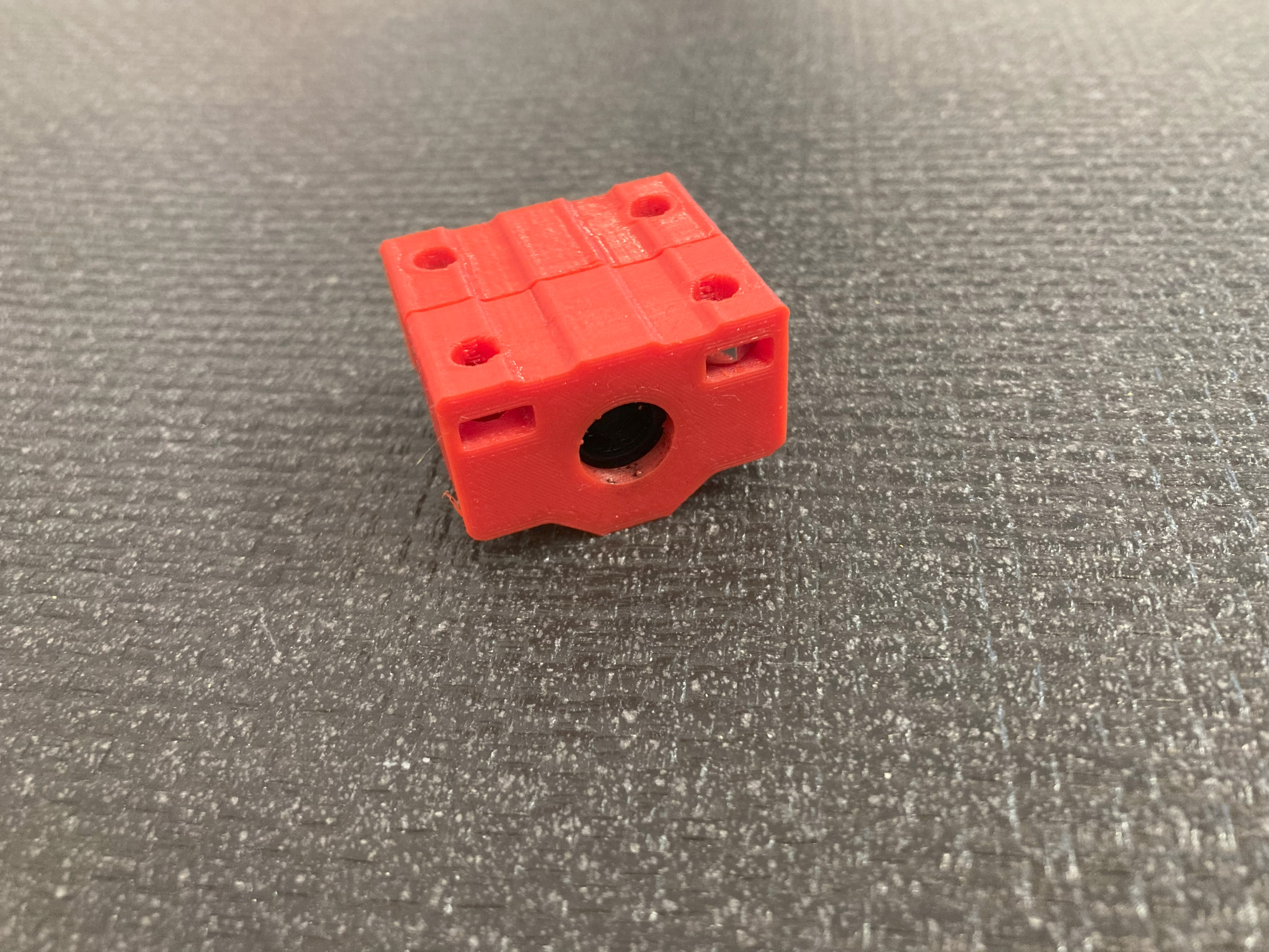 Housing for linear bearing