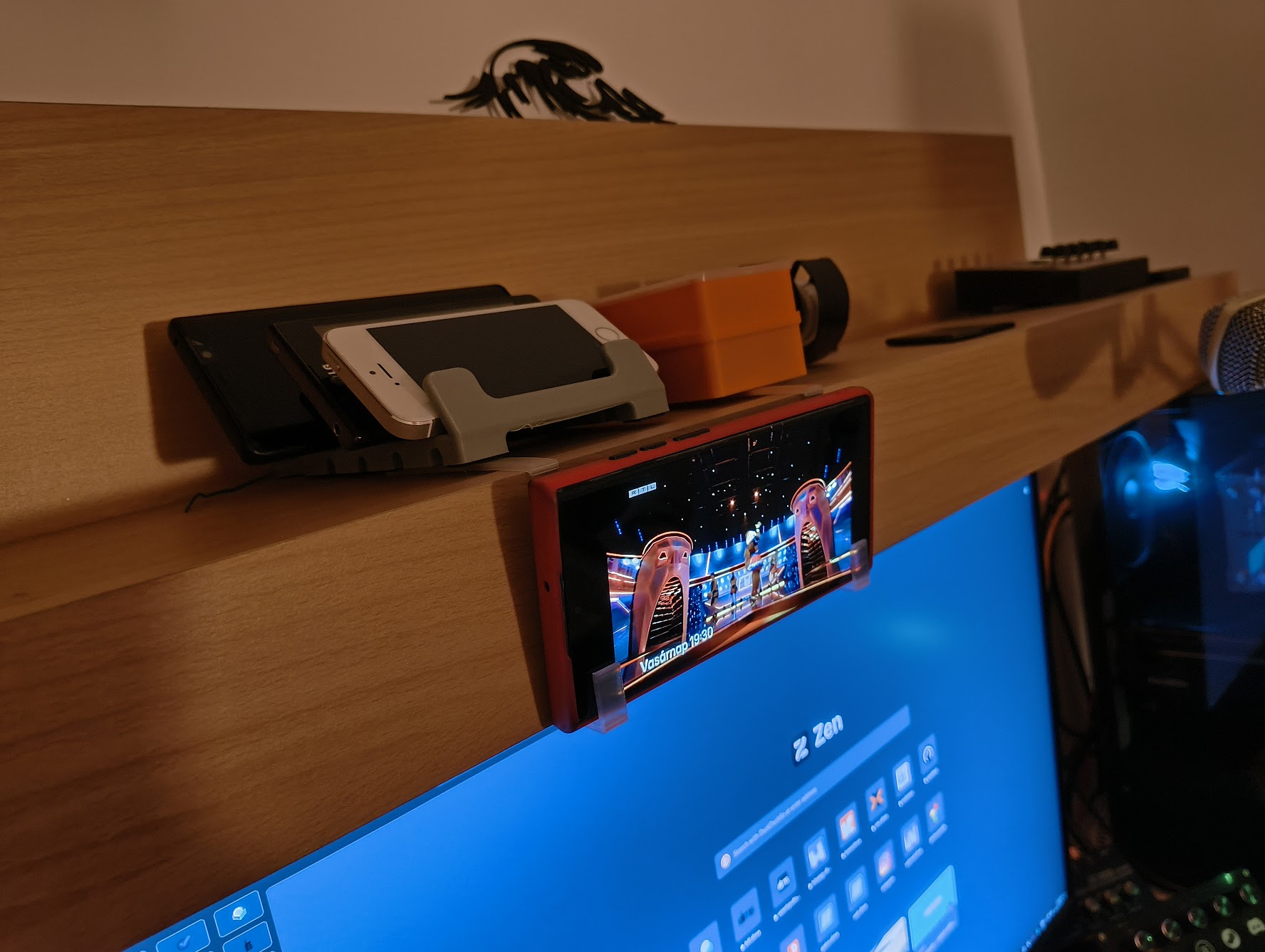 Phone holder for L shape shelf