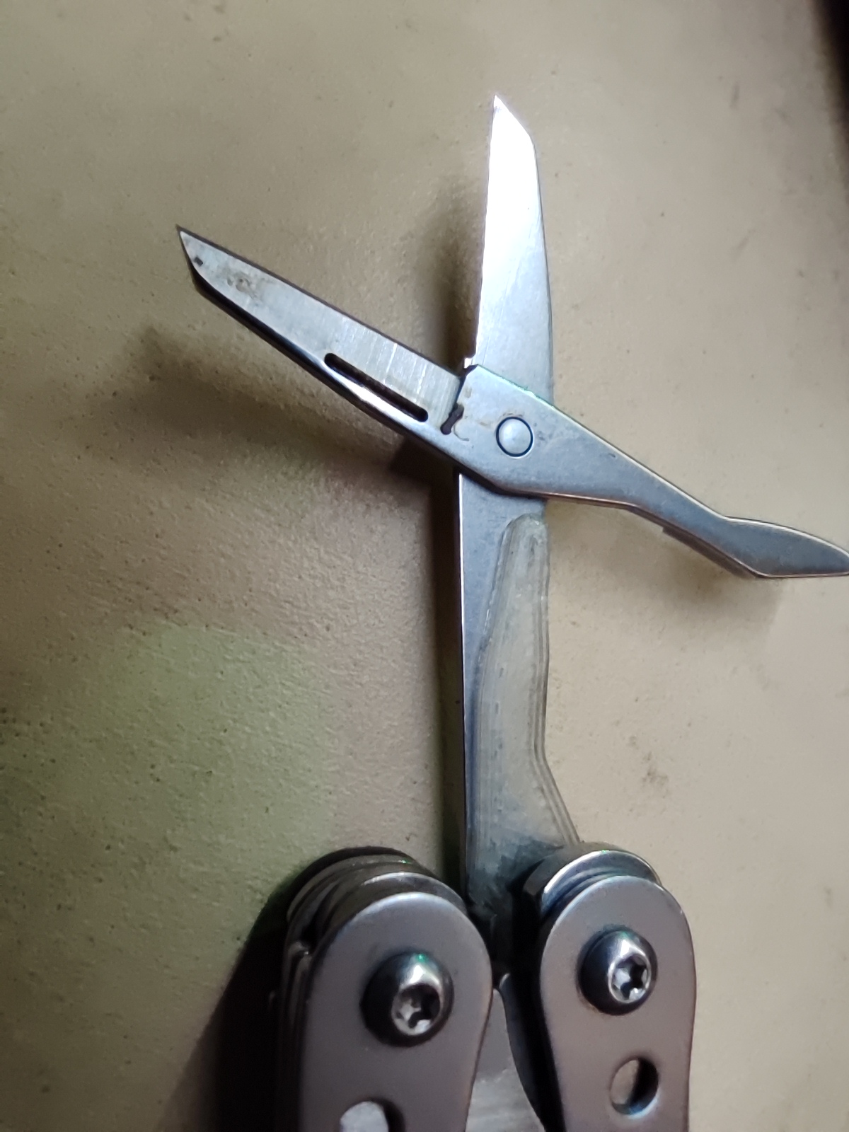 Leatherman Style scissor spring