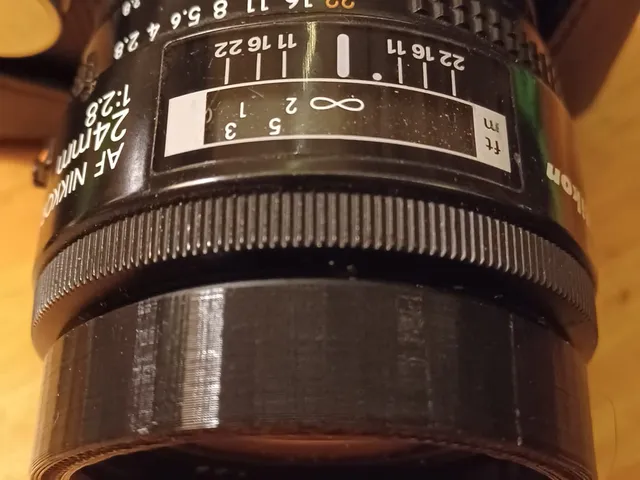 AF Nikkor 24 rim protector with 52mm filter thread v3