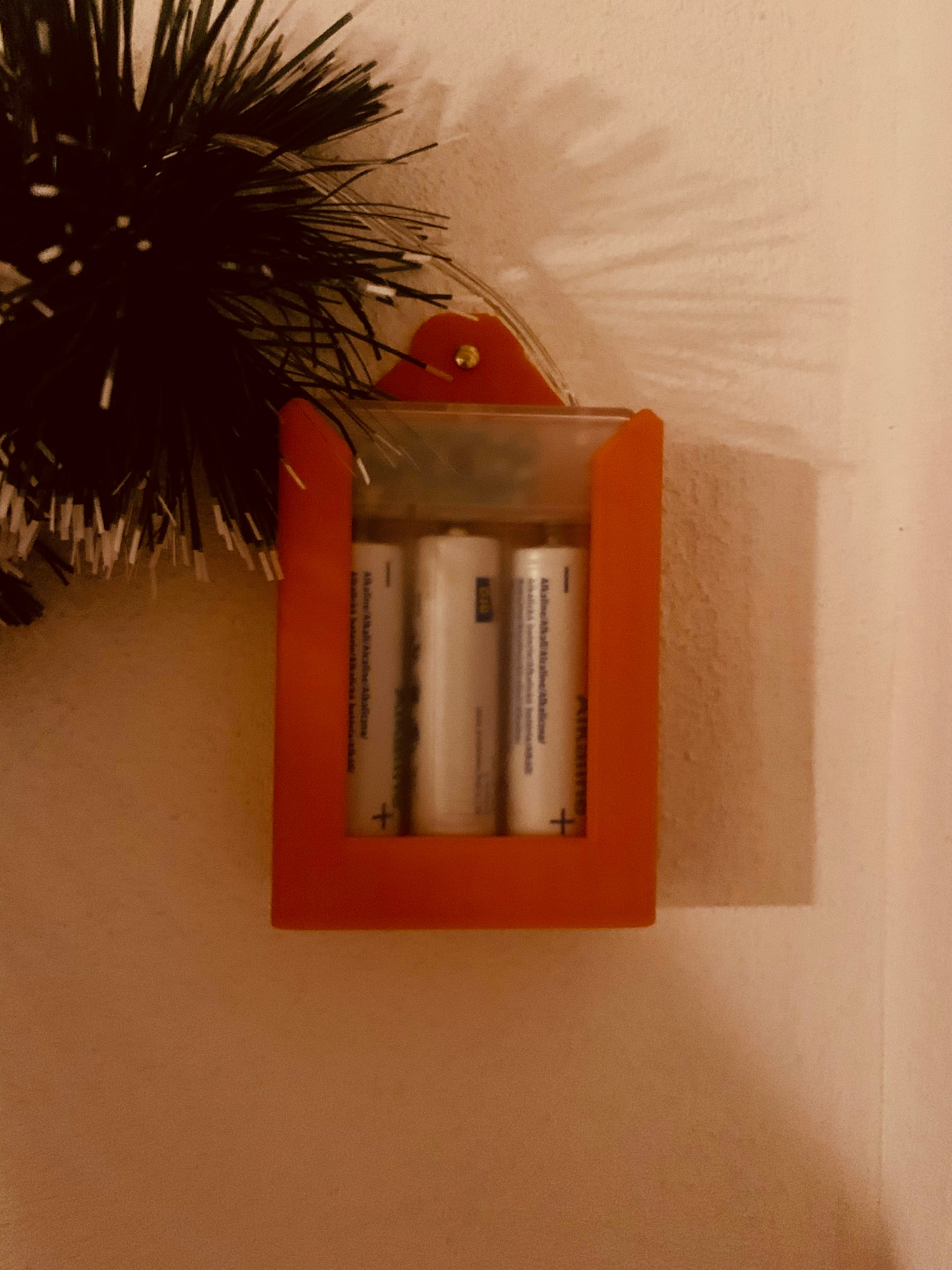 Battery holder for Christmas lights.