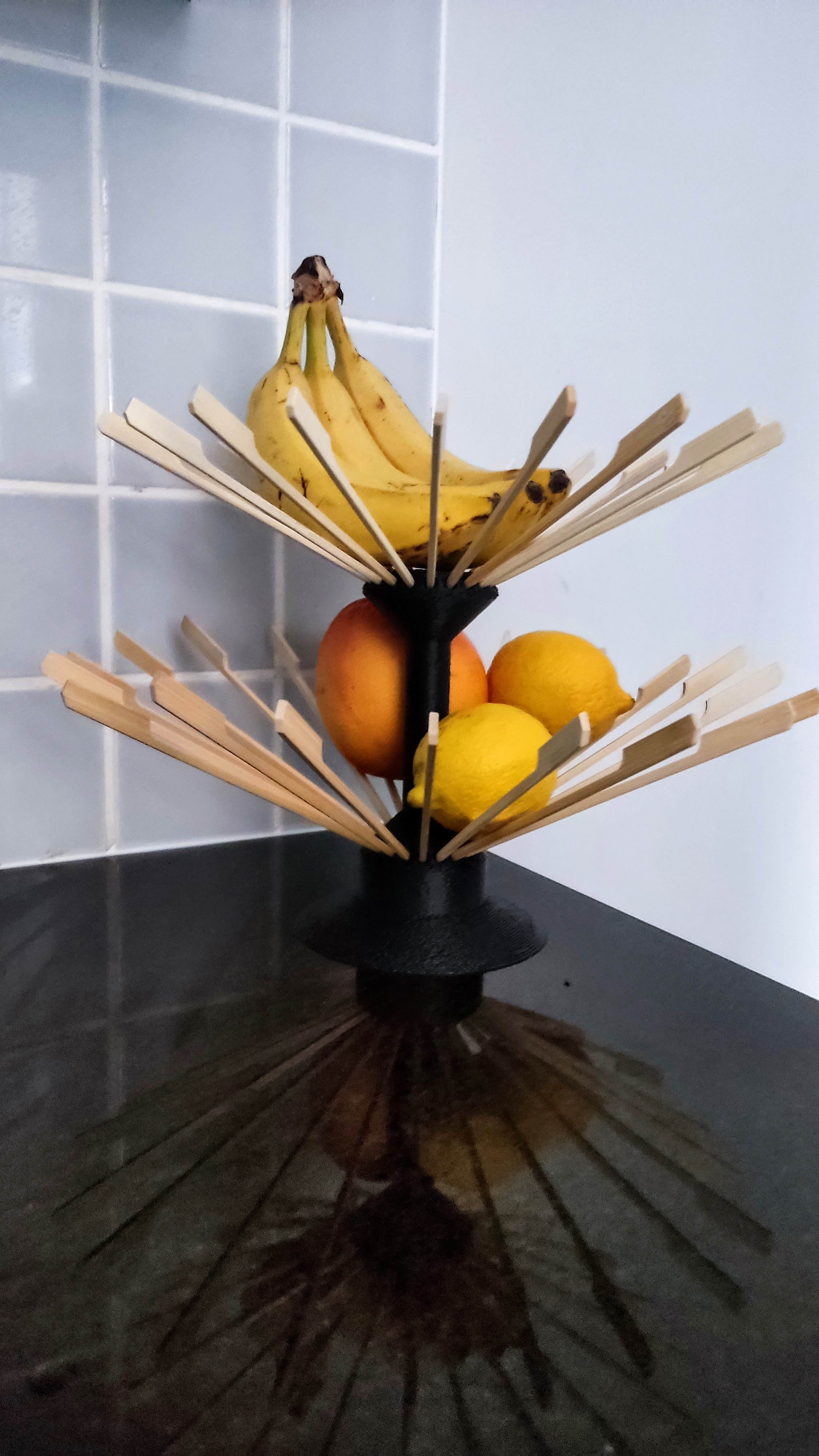 Fruit bowl with bamboo skewers