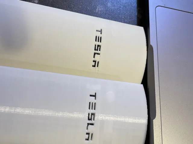Tesla Superchareger V4 front panel fixed text area