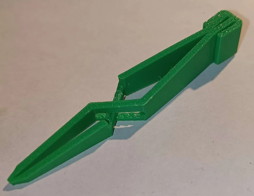 Cross Tweezer