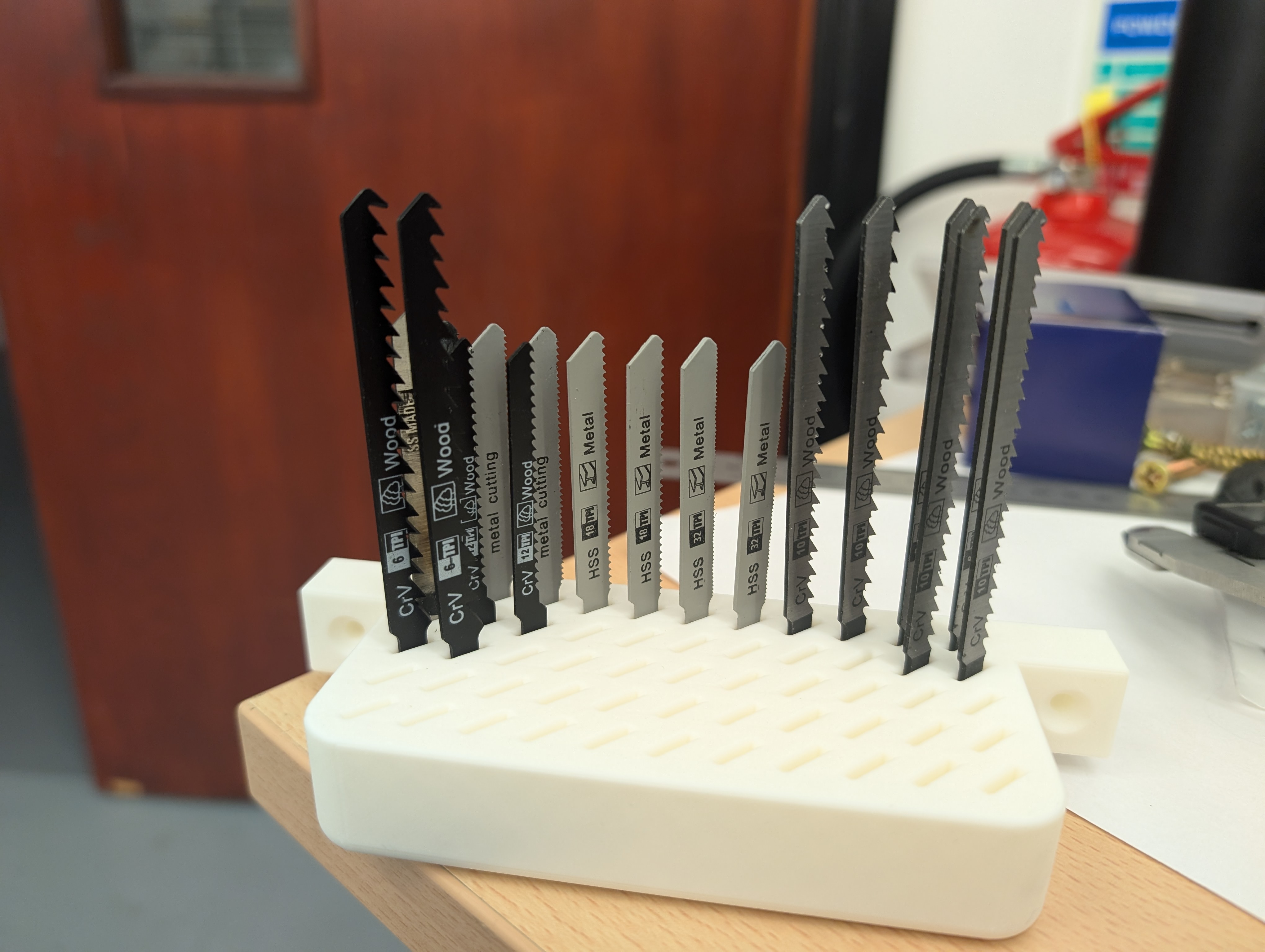 Jigsaw blade holder