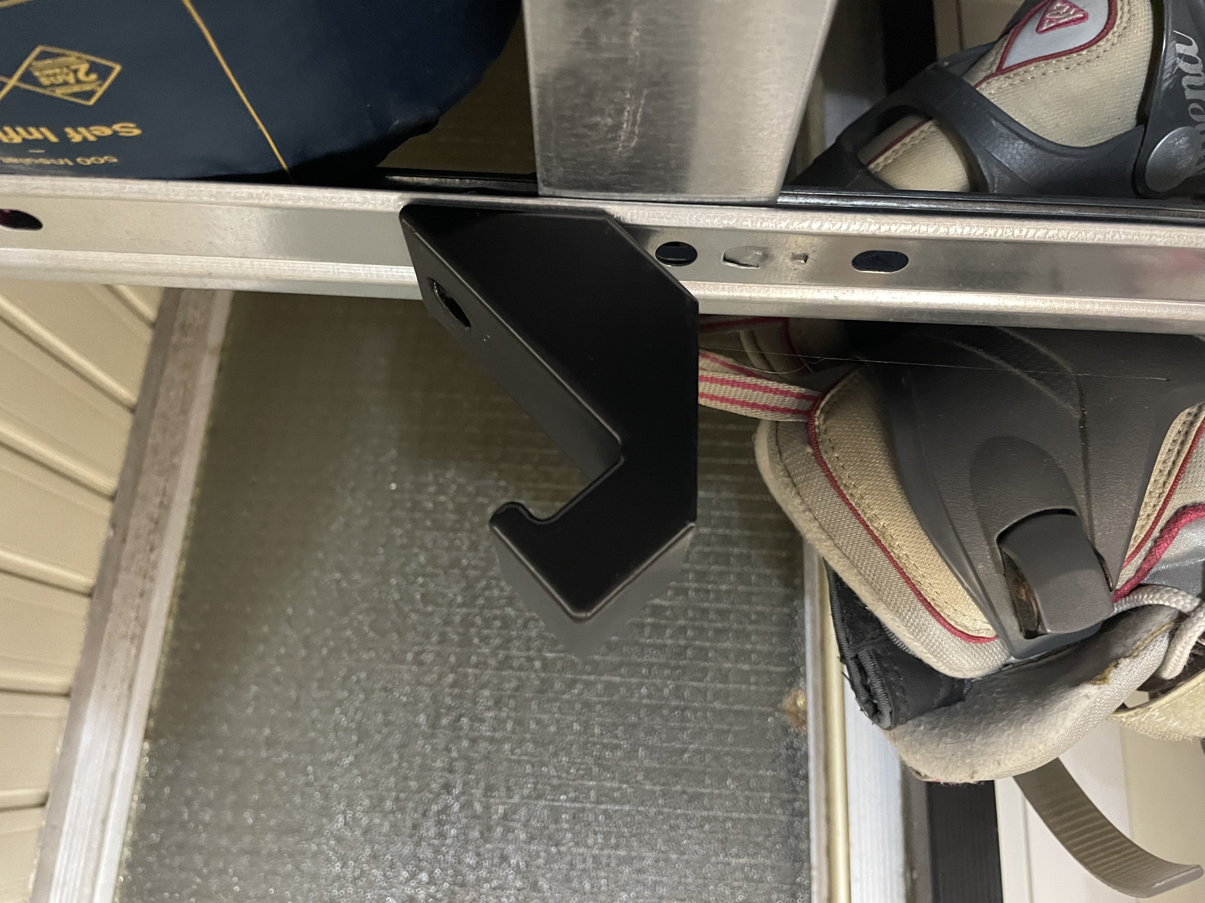 Versatile Hanger for Wall or Rack