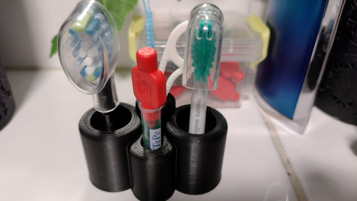 toothbrush stand for Sonicare brushes, TePe brush and dental floss stick