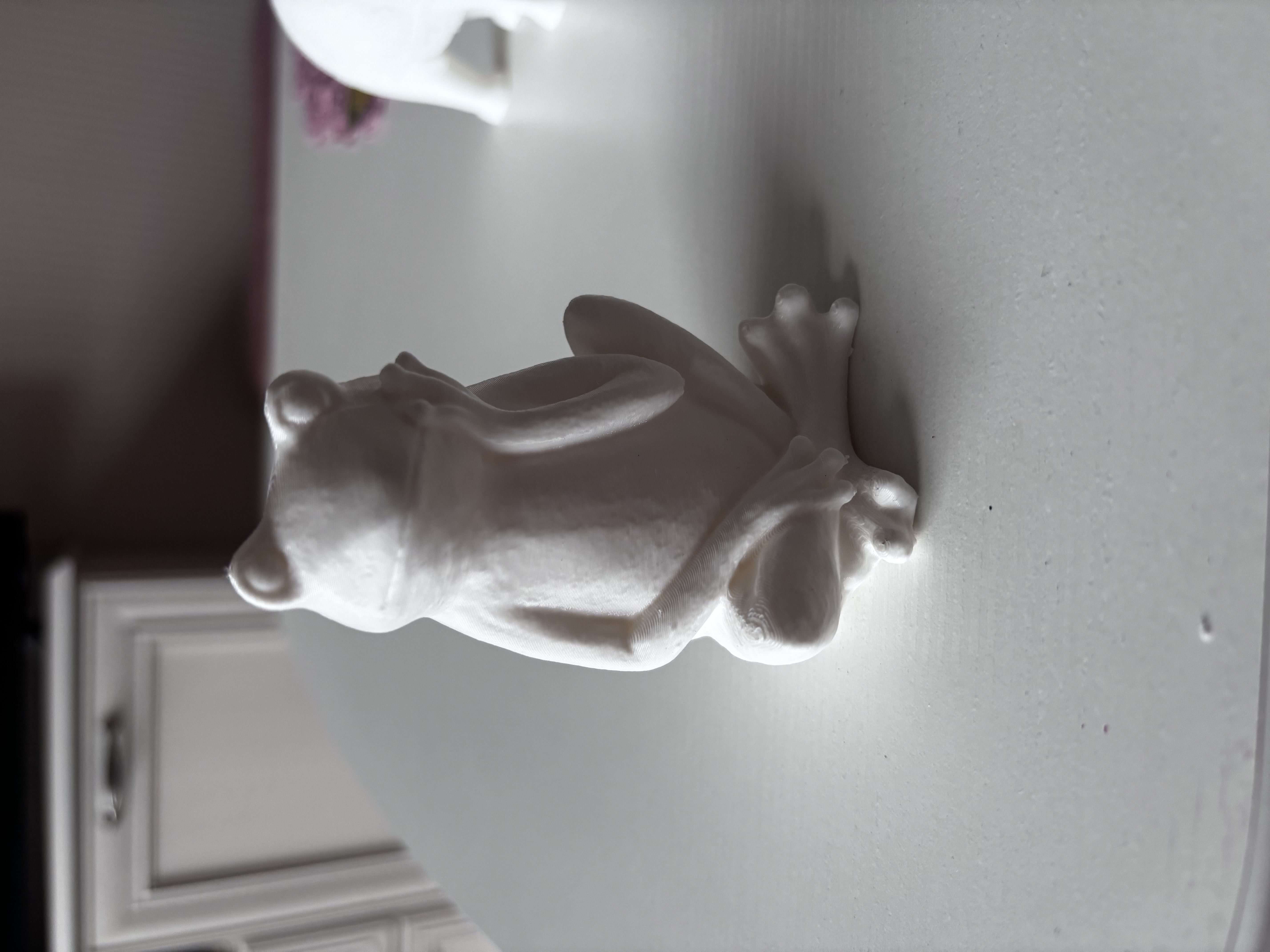 Sculpture of a thinking frog