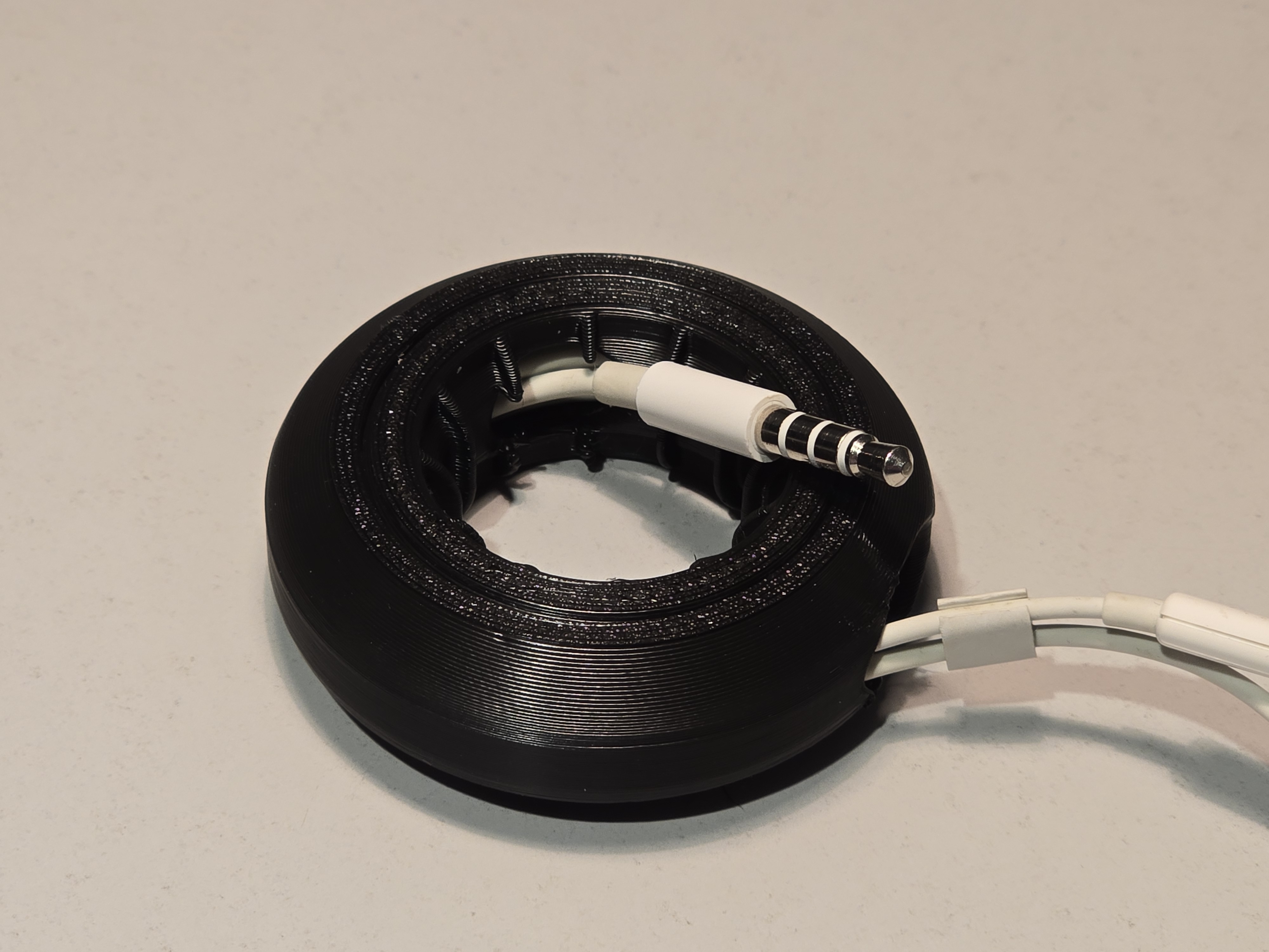 Next Gen Headset Cable Winder / Organizer (Print-in-Place, Multiple Sizes) 3D model thumbnail