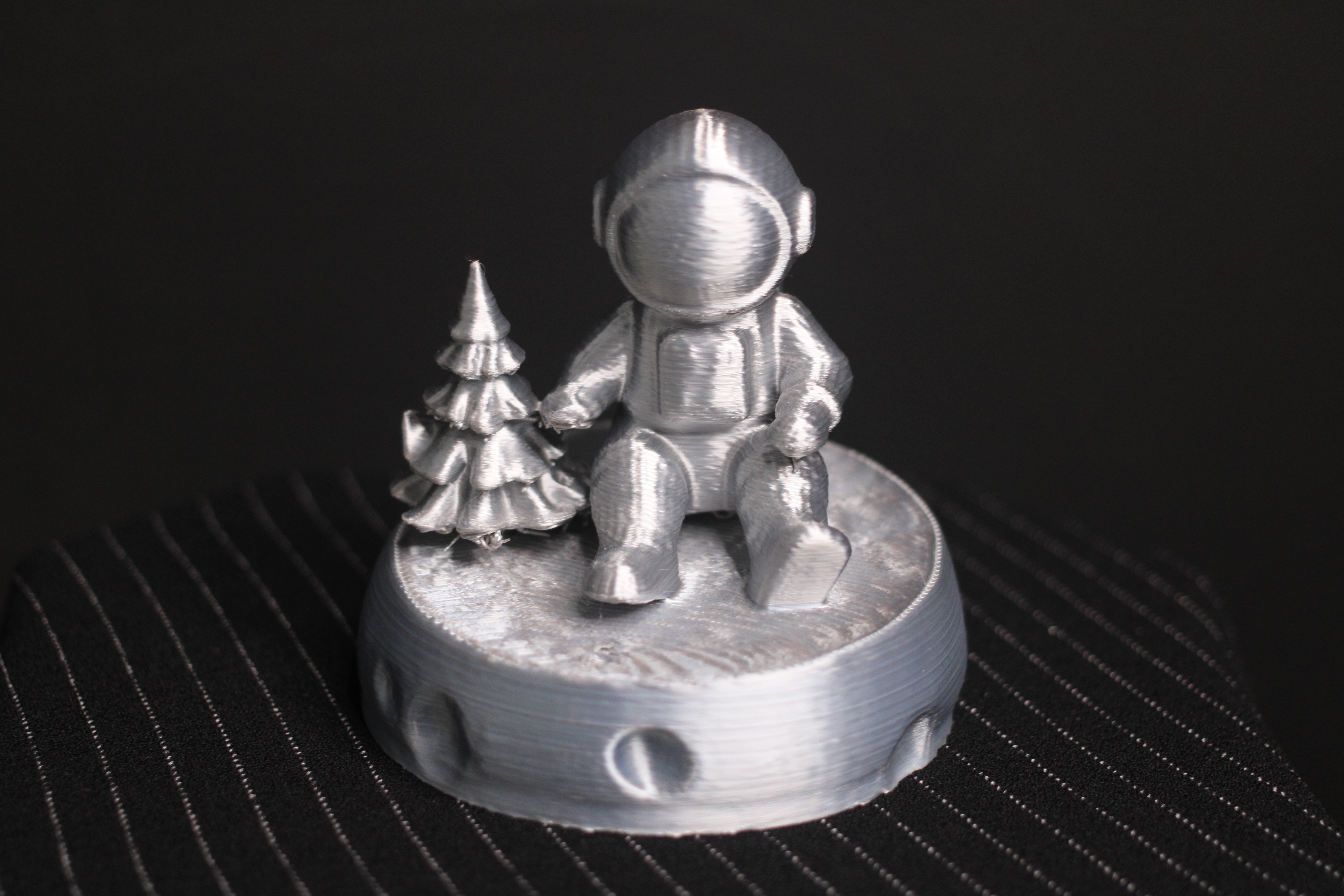 Astronaut with Christmas Tree