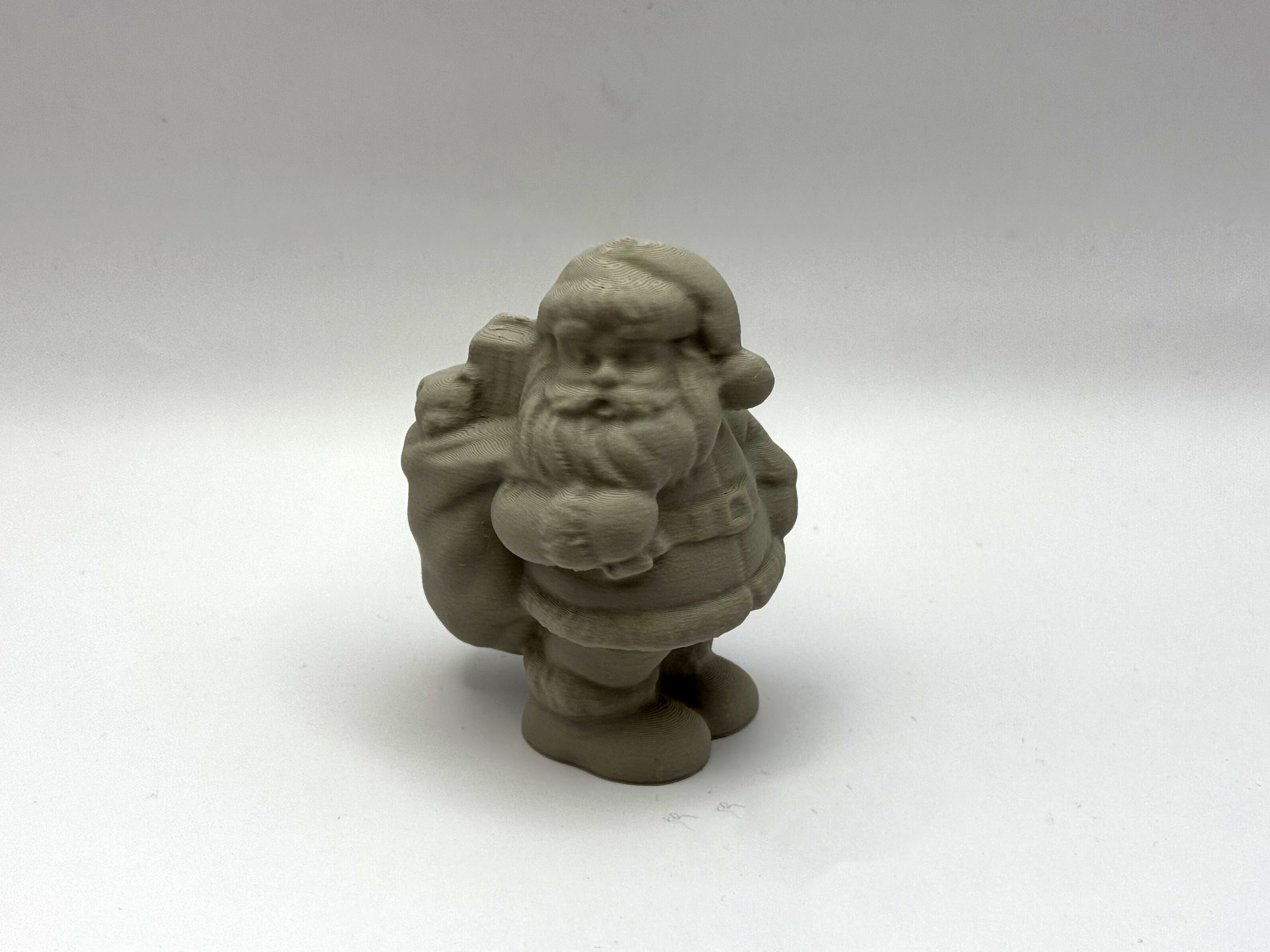 Santaclaus with Presents Bag Figurine