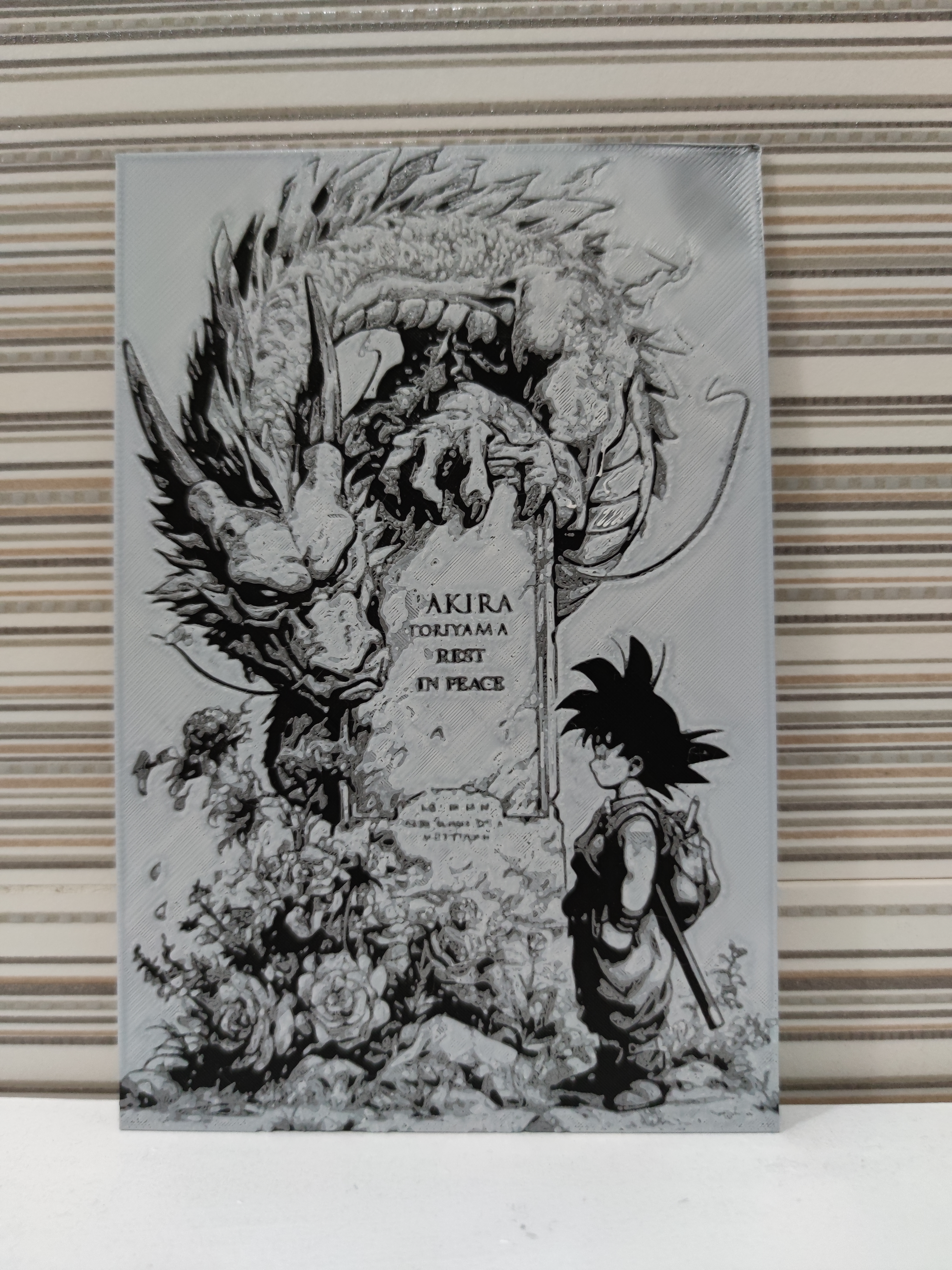 Goku's hueforge watching Akira's grave