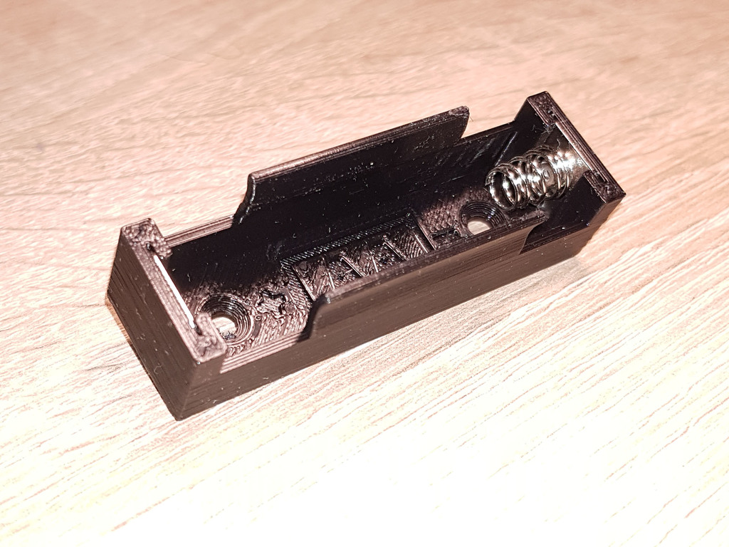 AA battery holder hanger