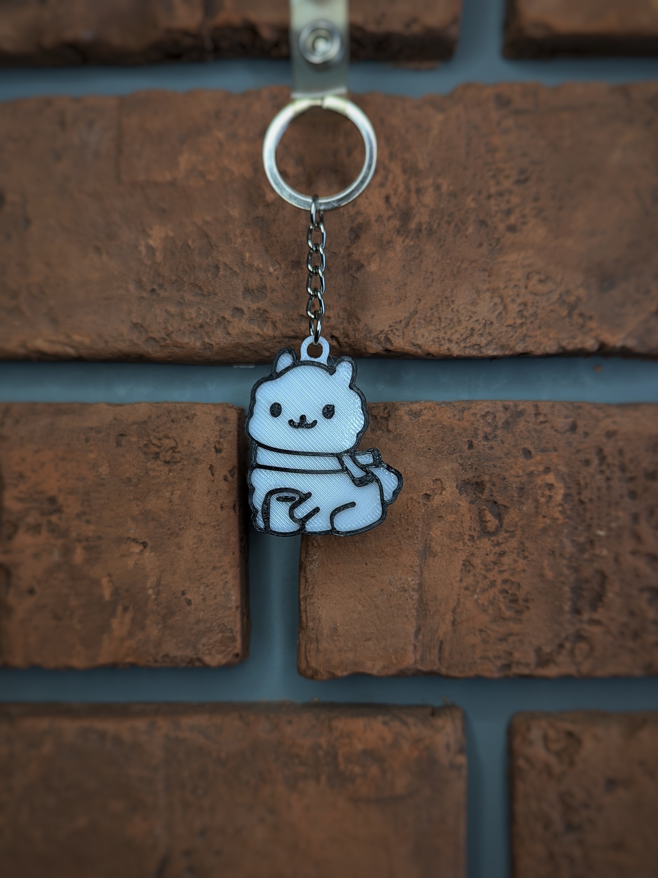 Lama with a coffee keychain