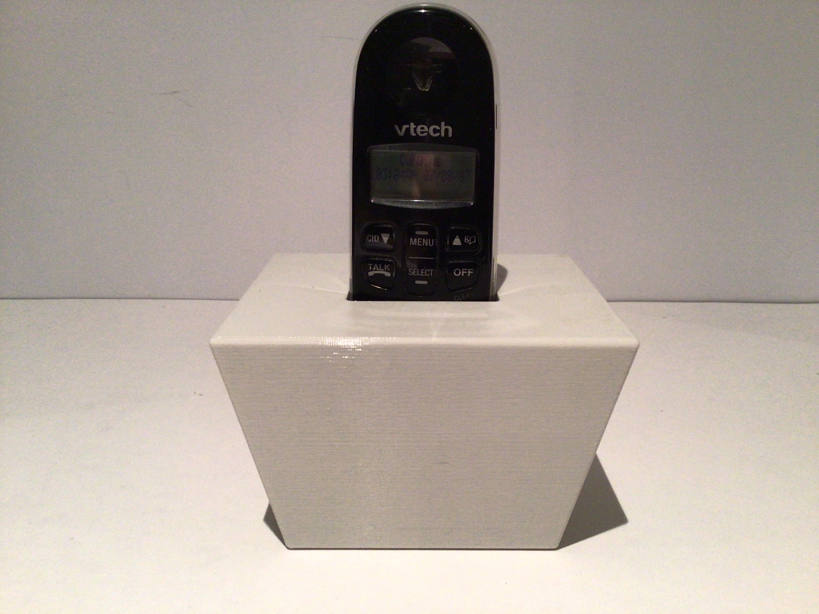 Base for a wireless standard home phone