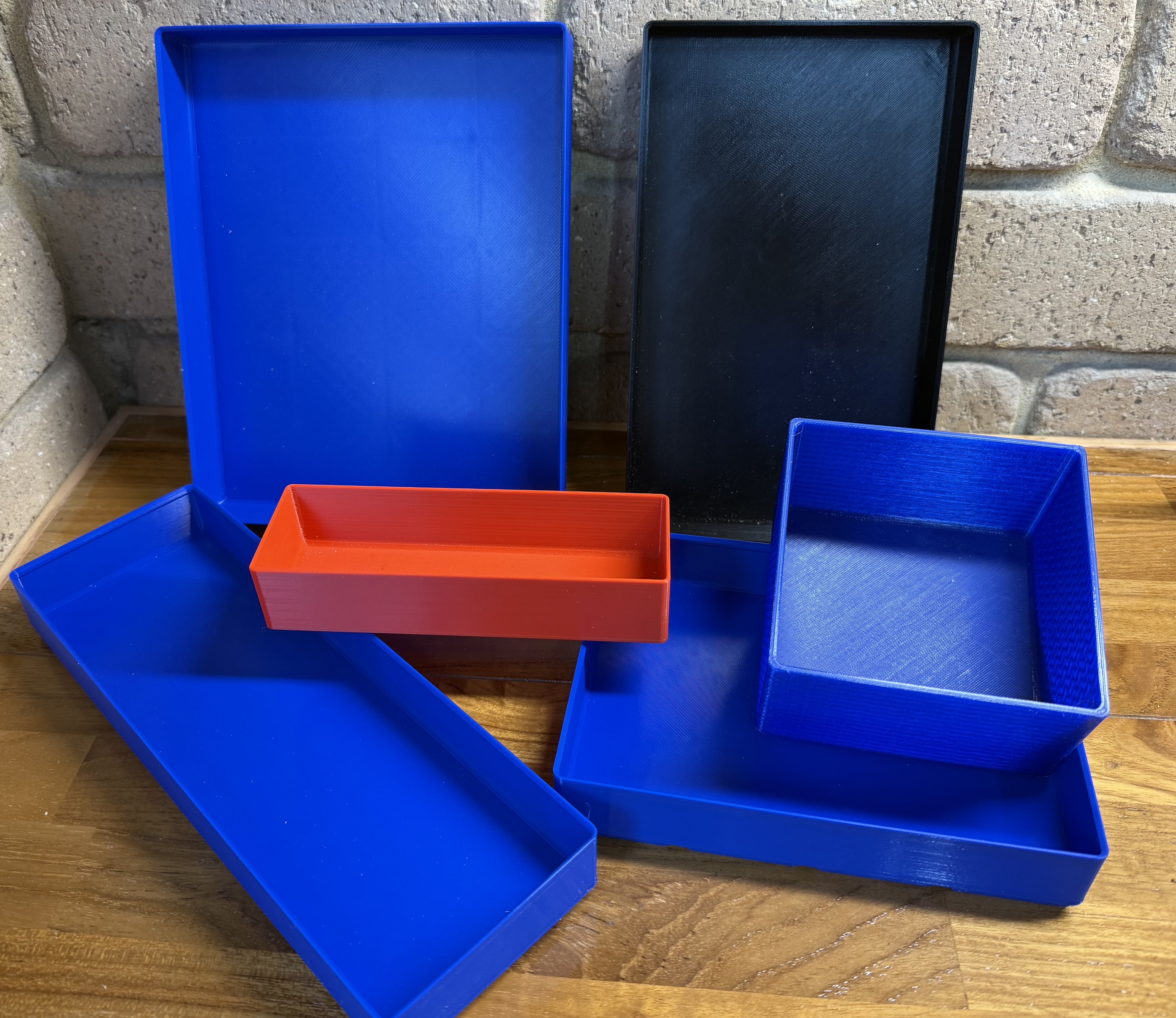 22 Gridfinity Bins in various sizes.