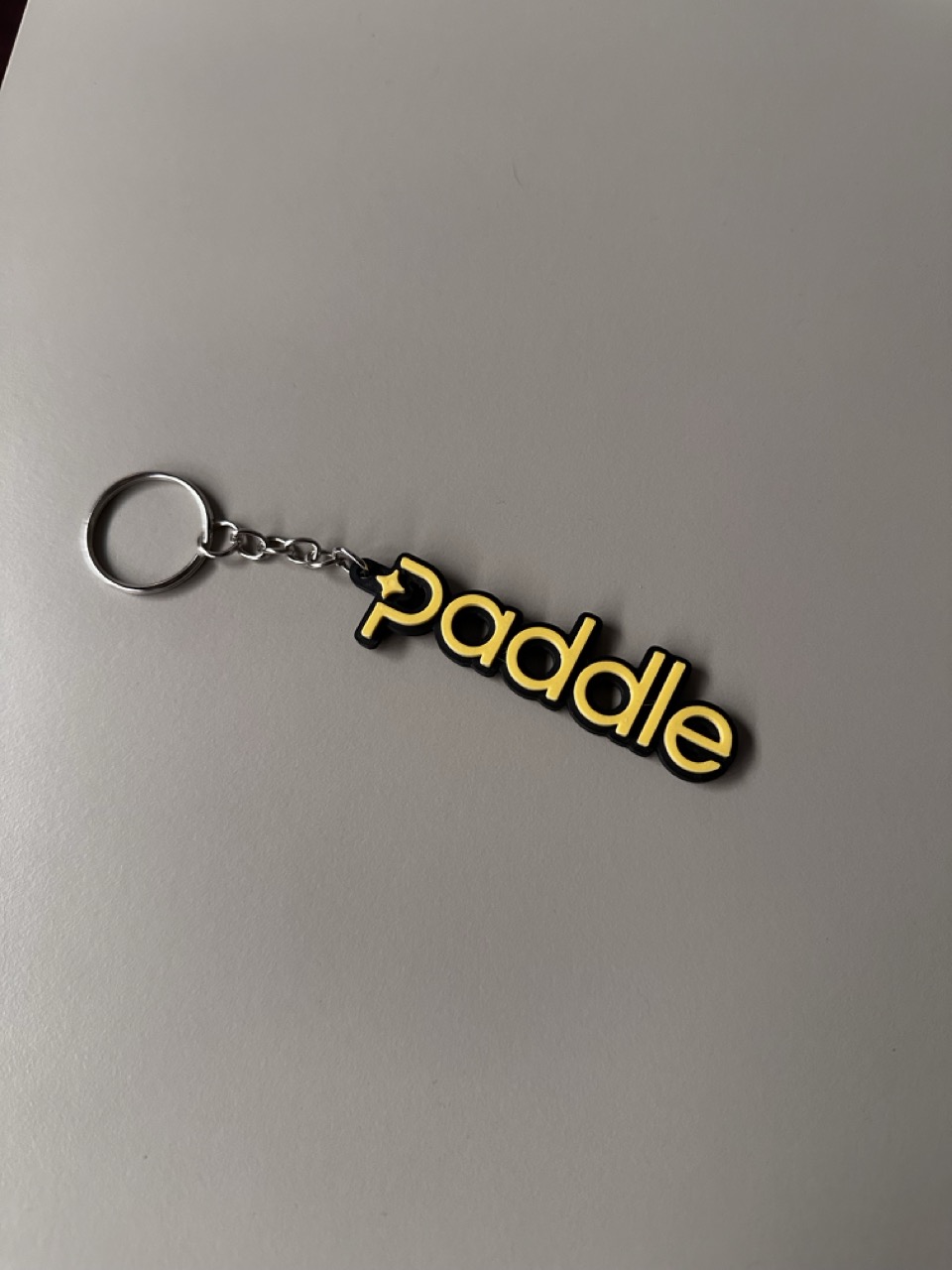 Paddle logo keychain