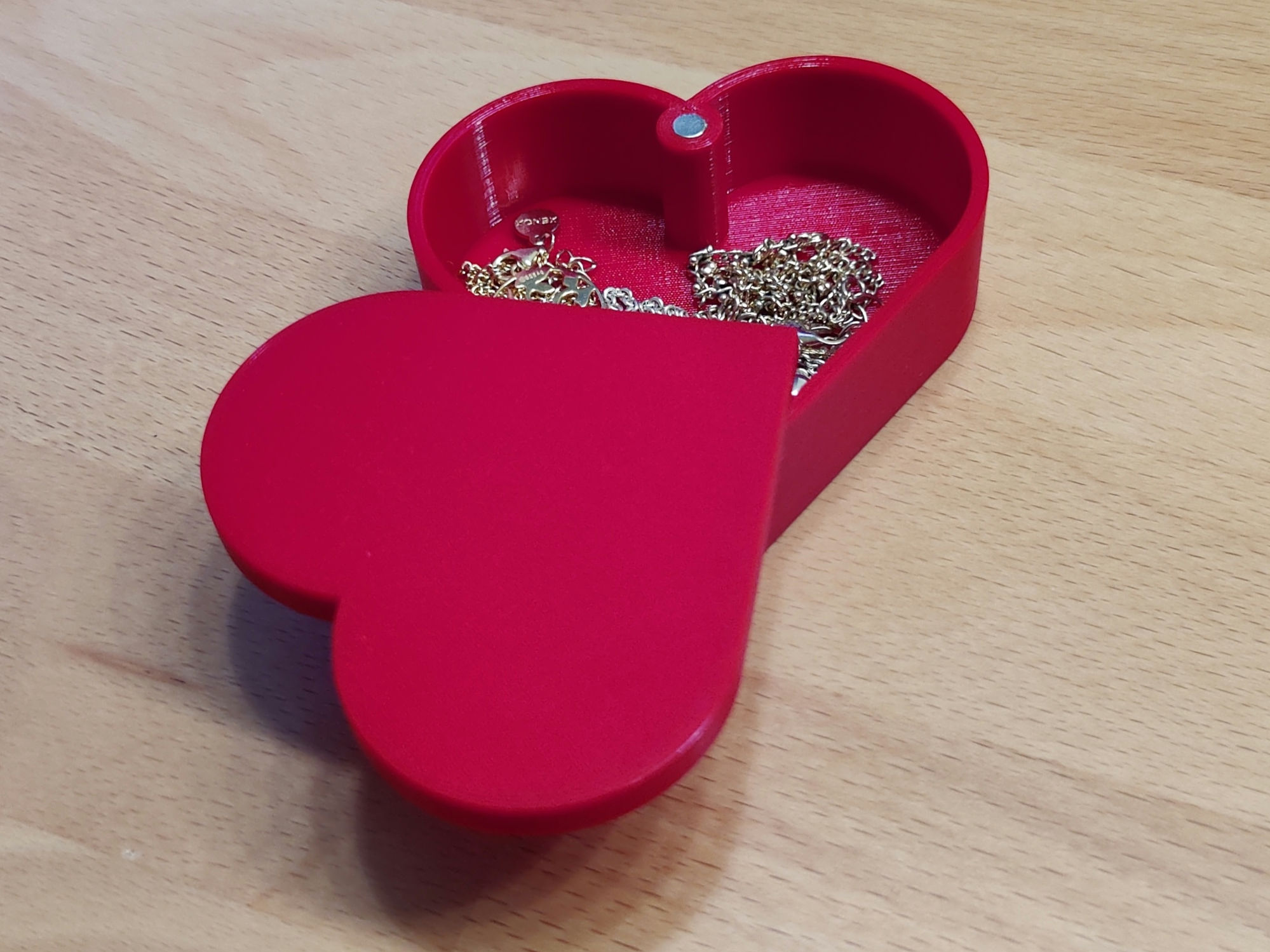 Heart shaped box with magnetic latch
