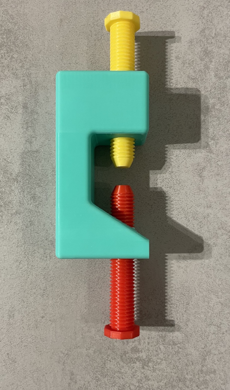 Toddler toy with two screws