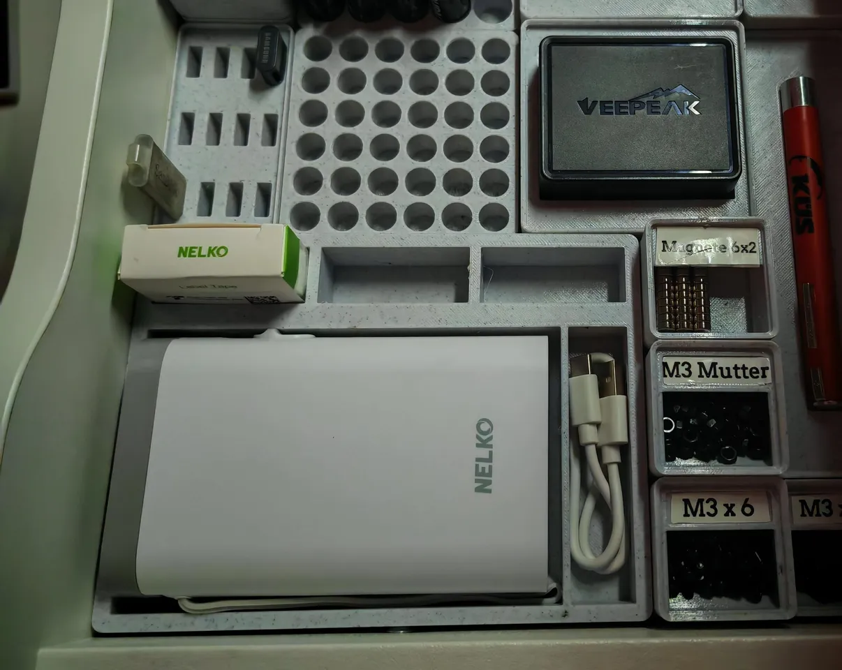 Nelko P21 Labelprinter - Gridfinity Holder by rageknuff | Download