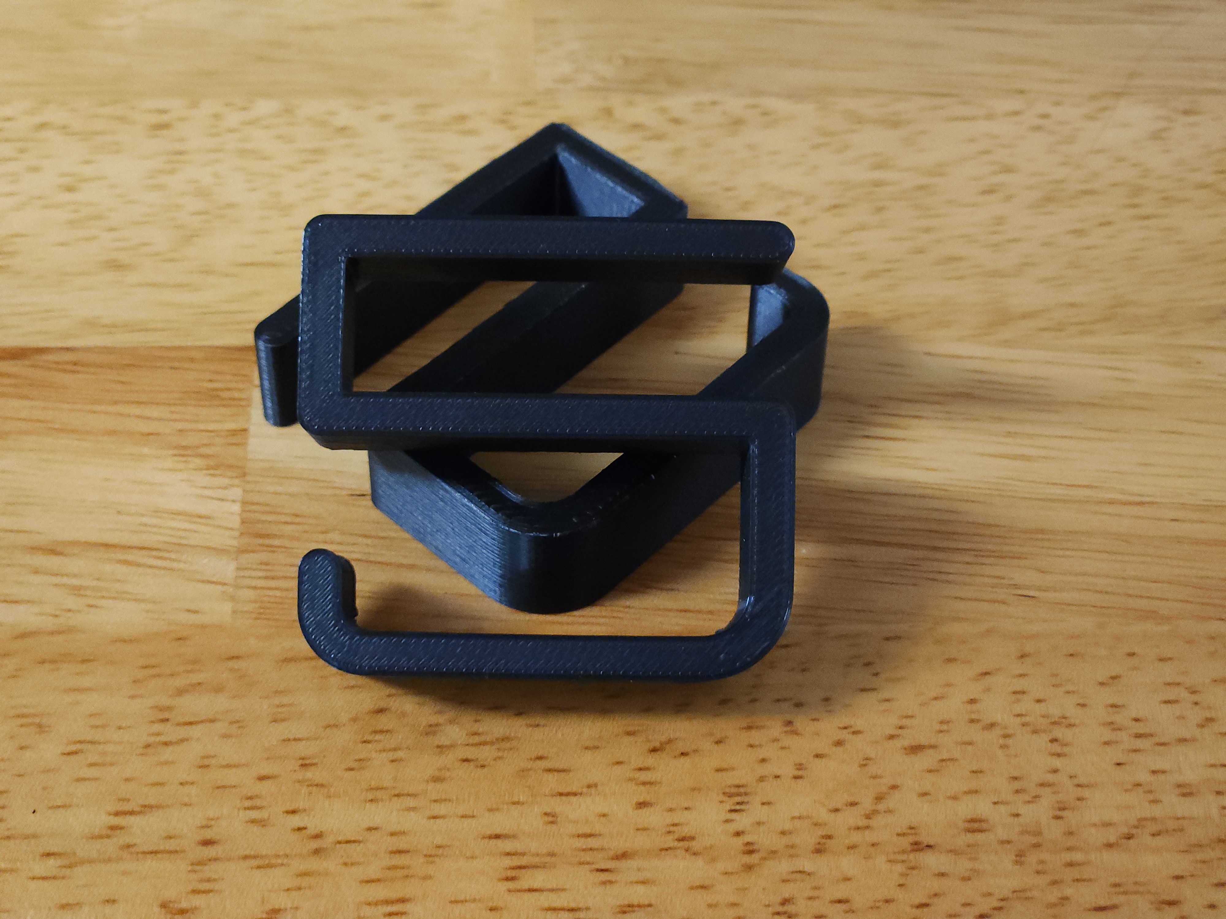 Parametric desk hook for cables