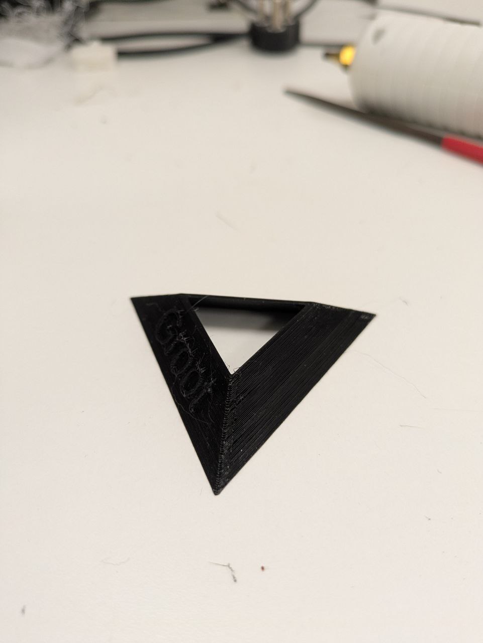Triangular base/stand