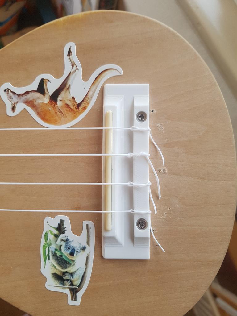 Ukulele tie bar / bridge and saddle