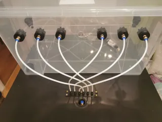 Removable plate holder for PTFE tube caps.
