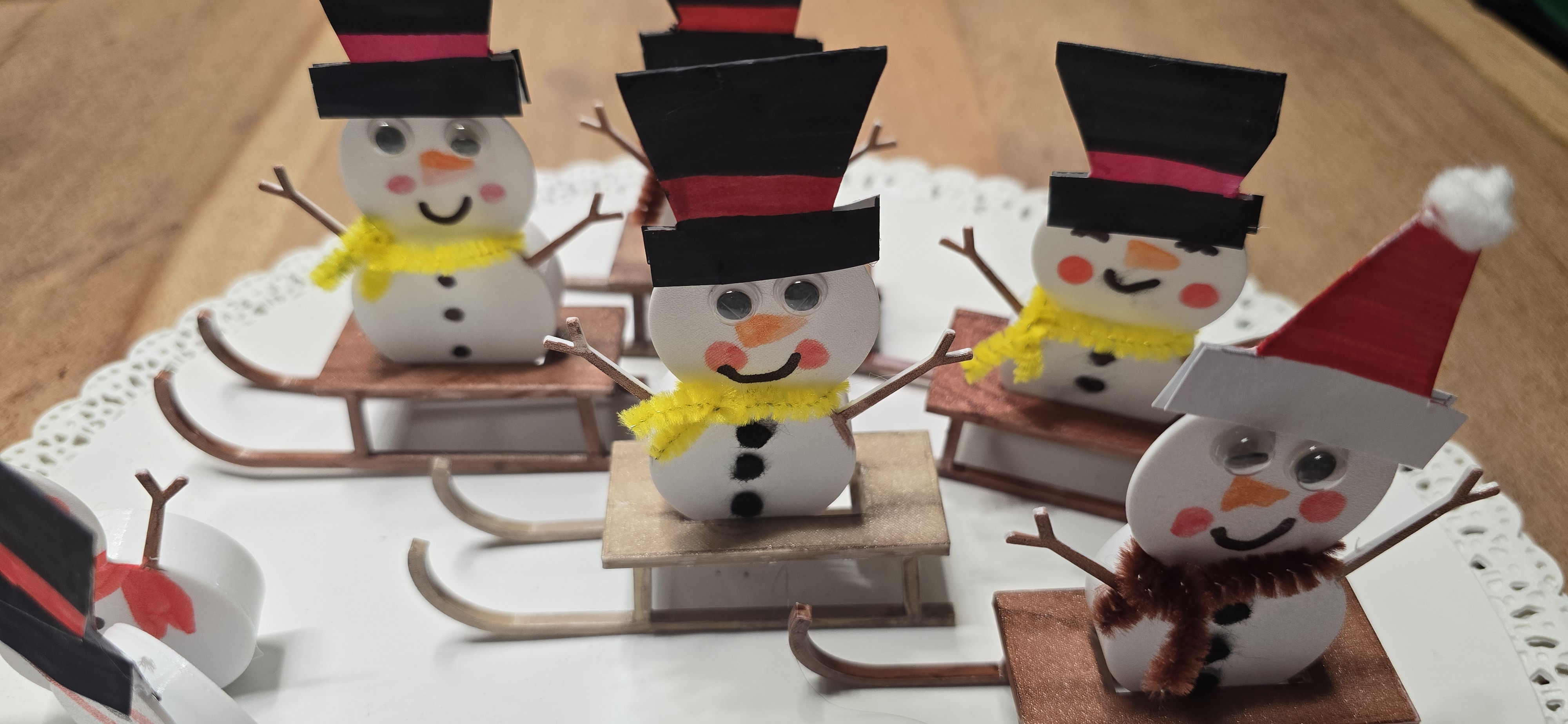 Snowman with sled.