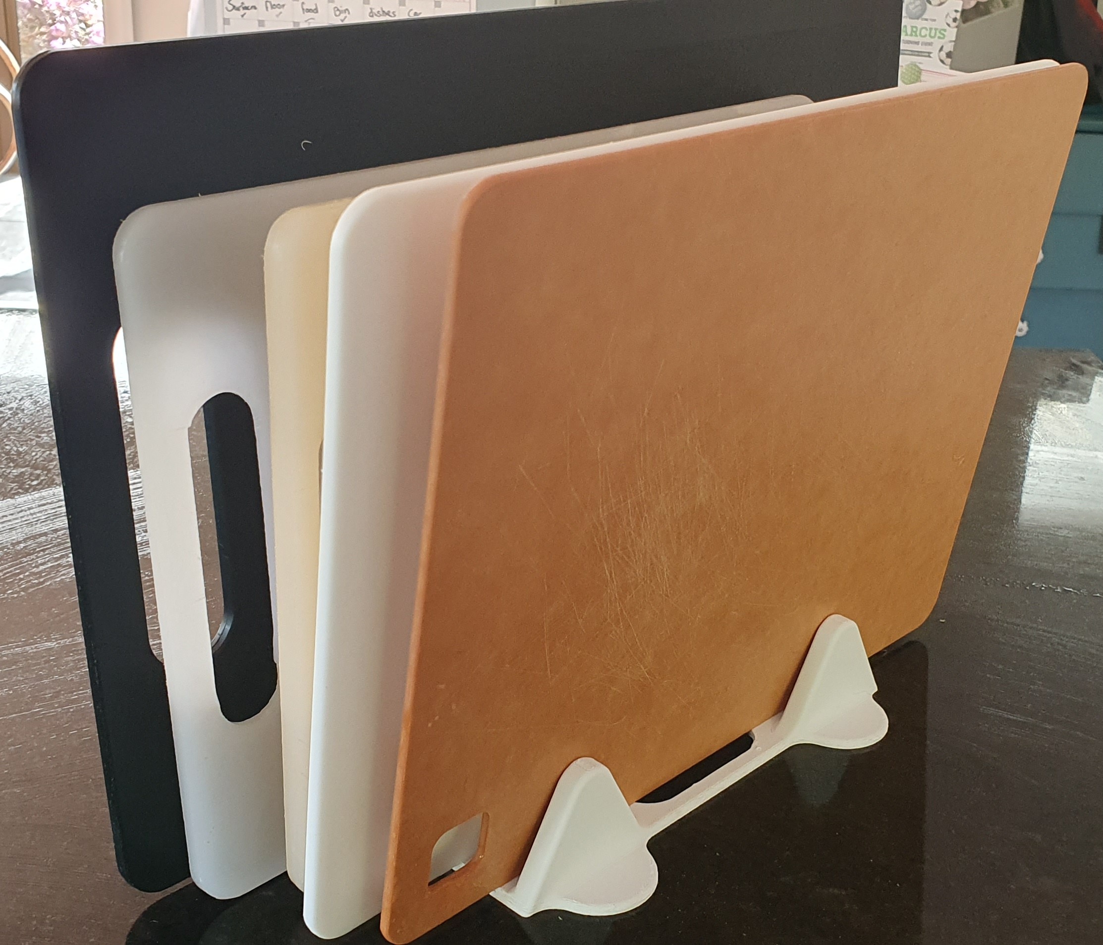 Vertical plastic cutting board holder