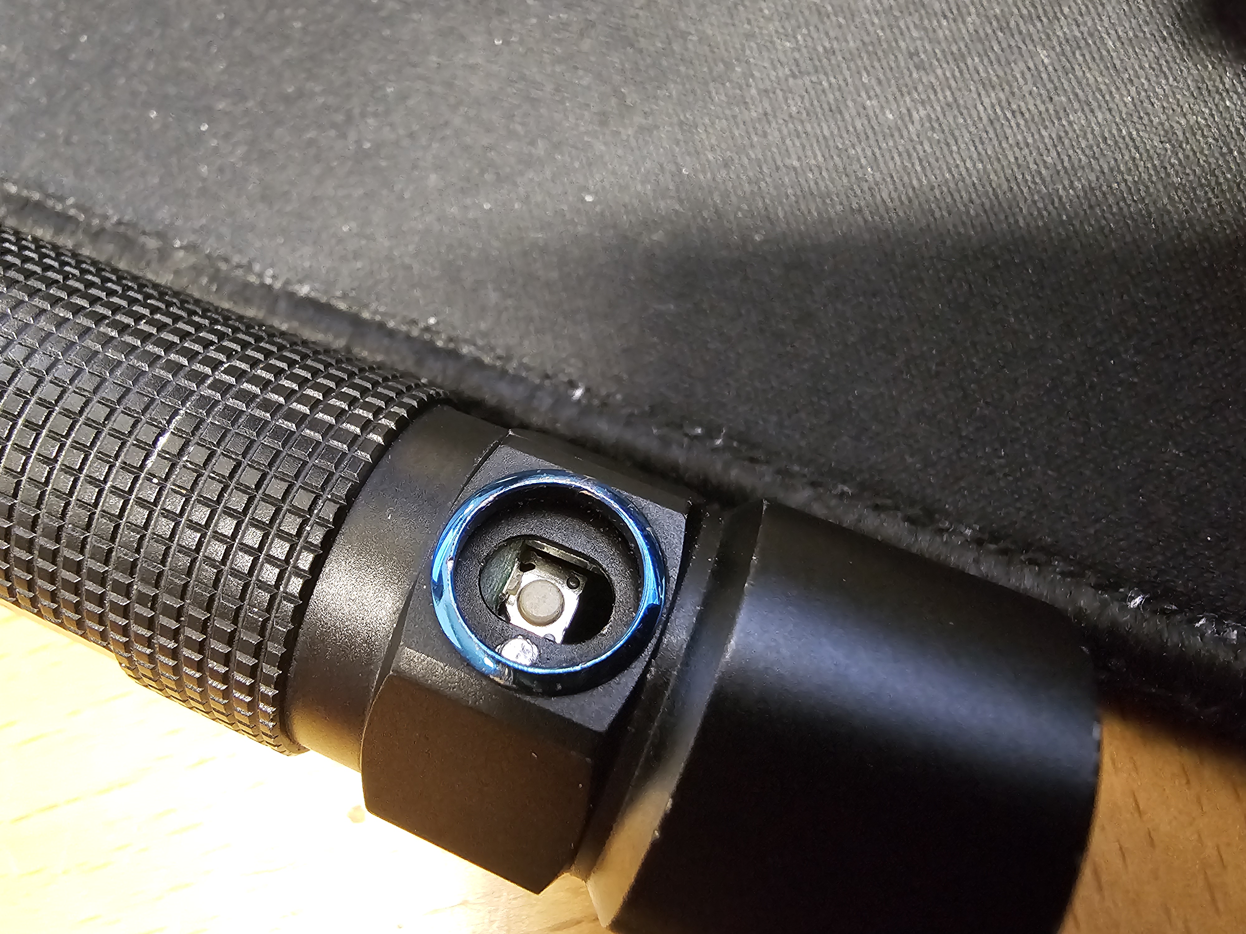Olight S2 baton replacement button