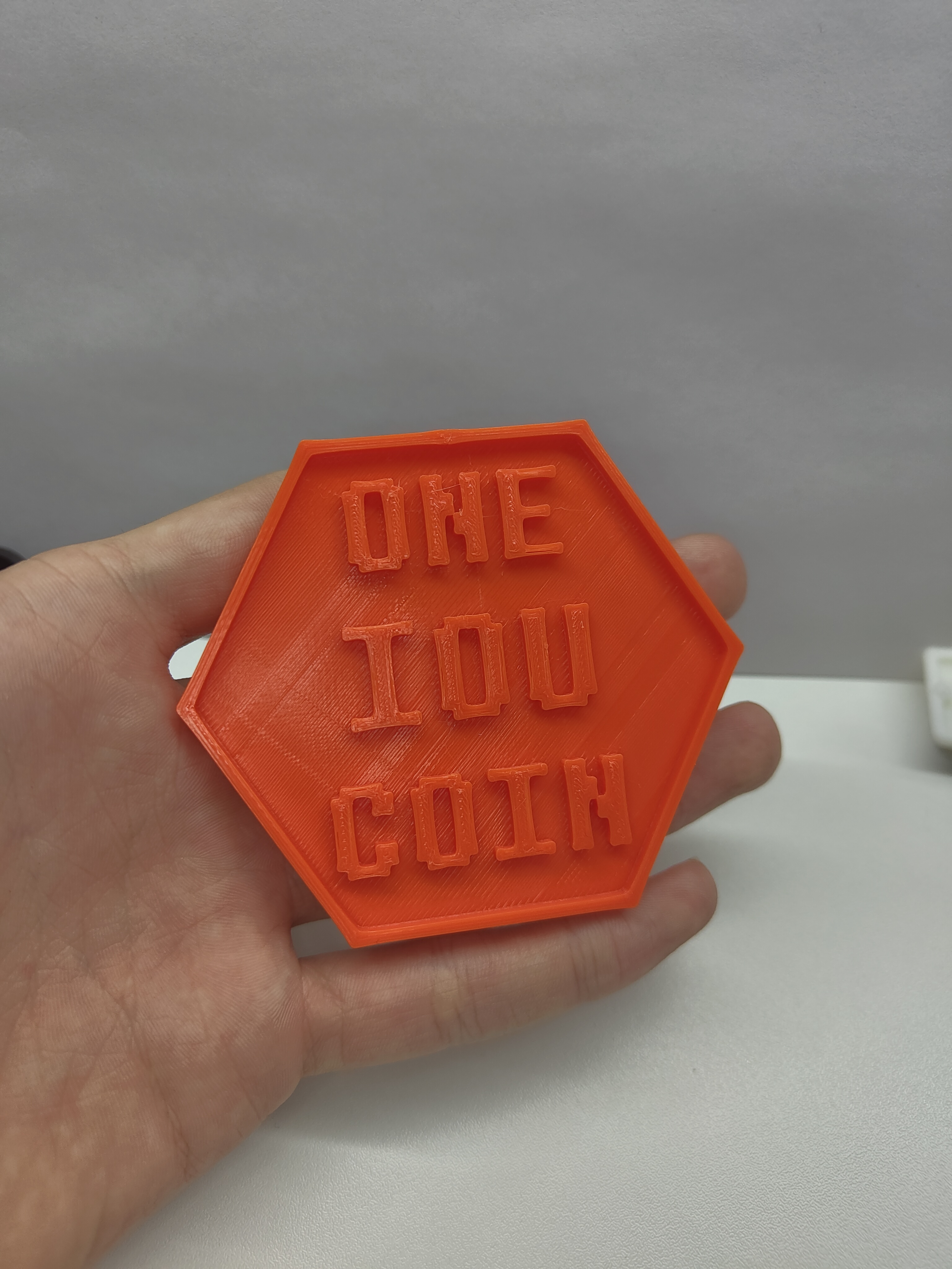 Hexagonal IOU Coin
