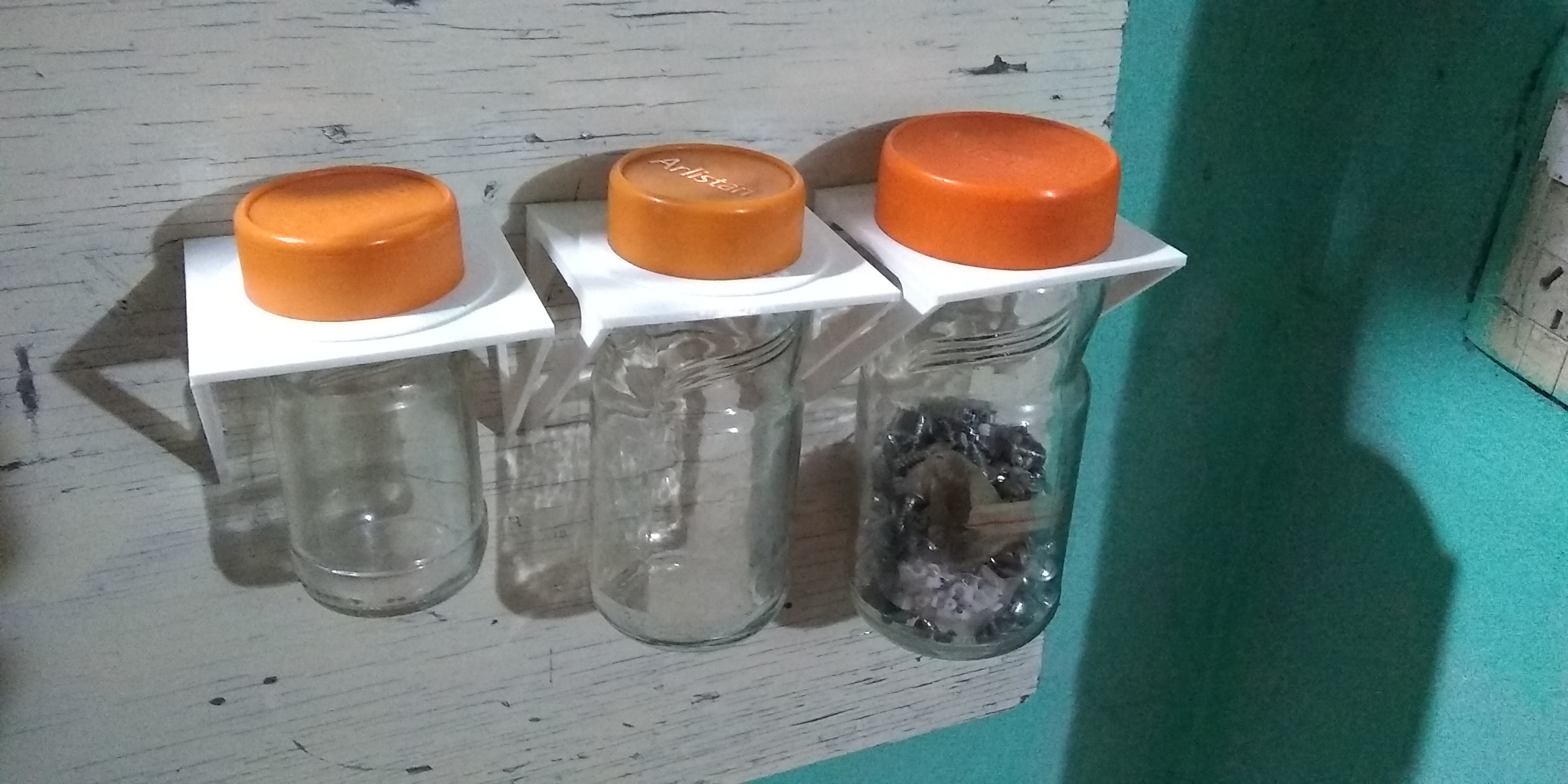 Soporte para frascos de cafe