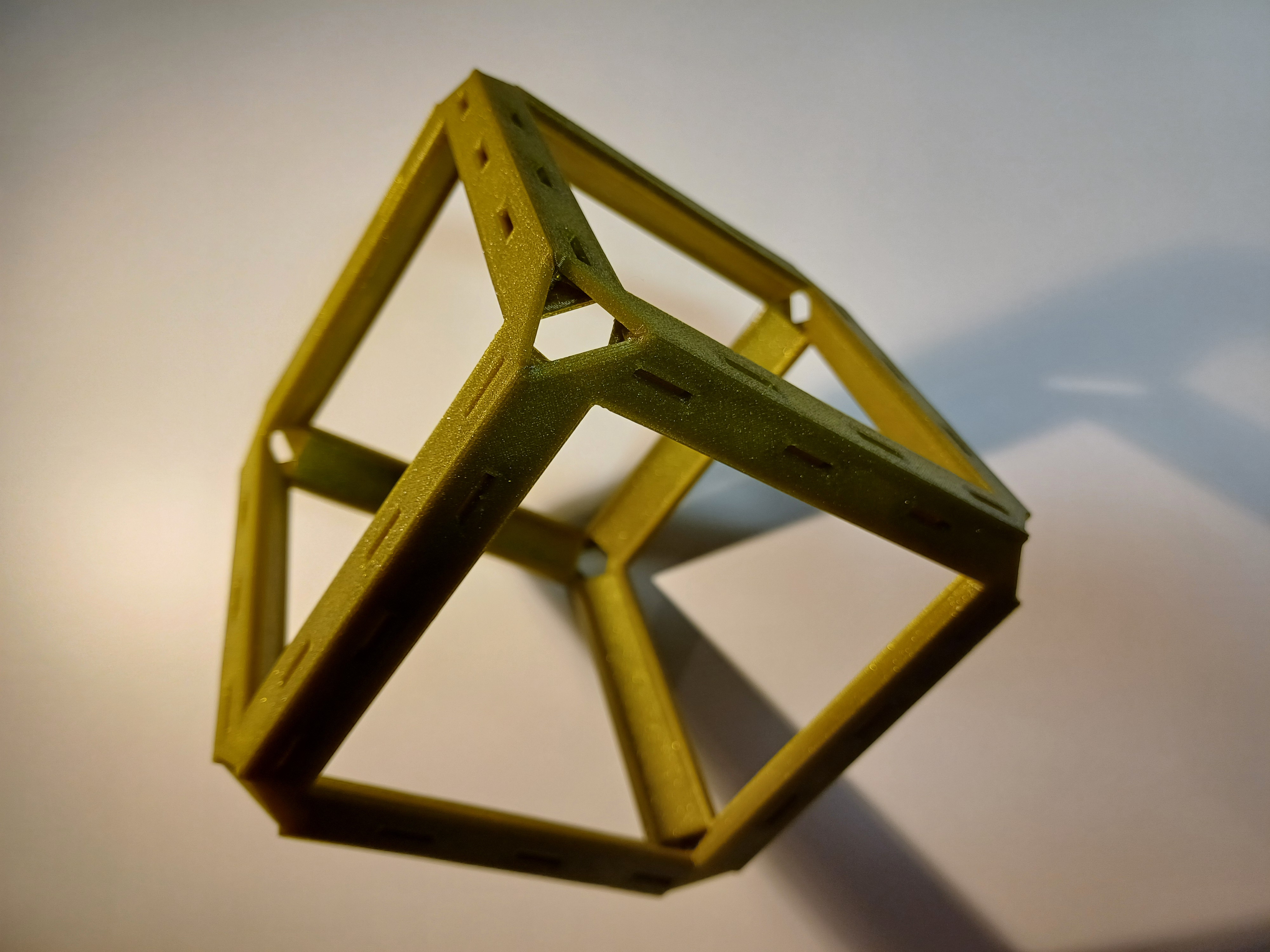 Cubic frame with a first layer finish from all sides.