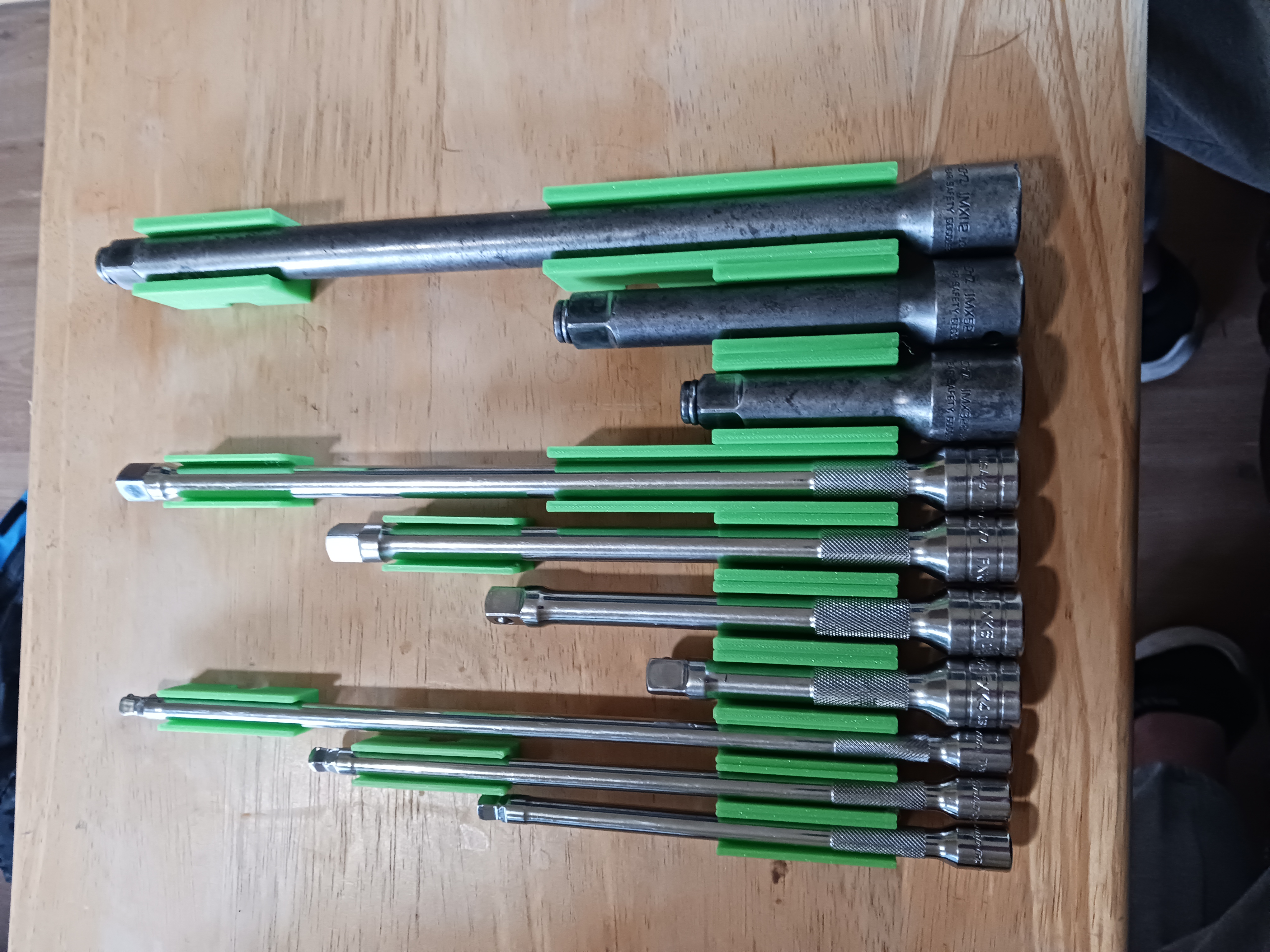 Universal extension holder/organizer