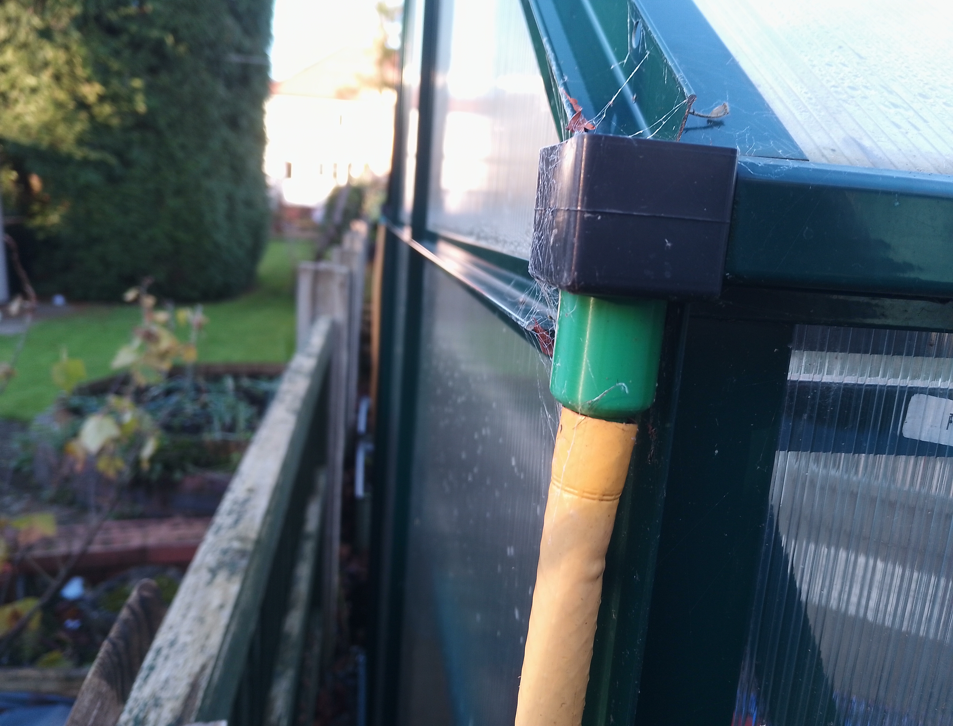 Greenhouse downpipe hose connector