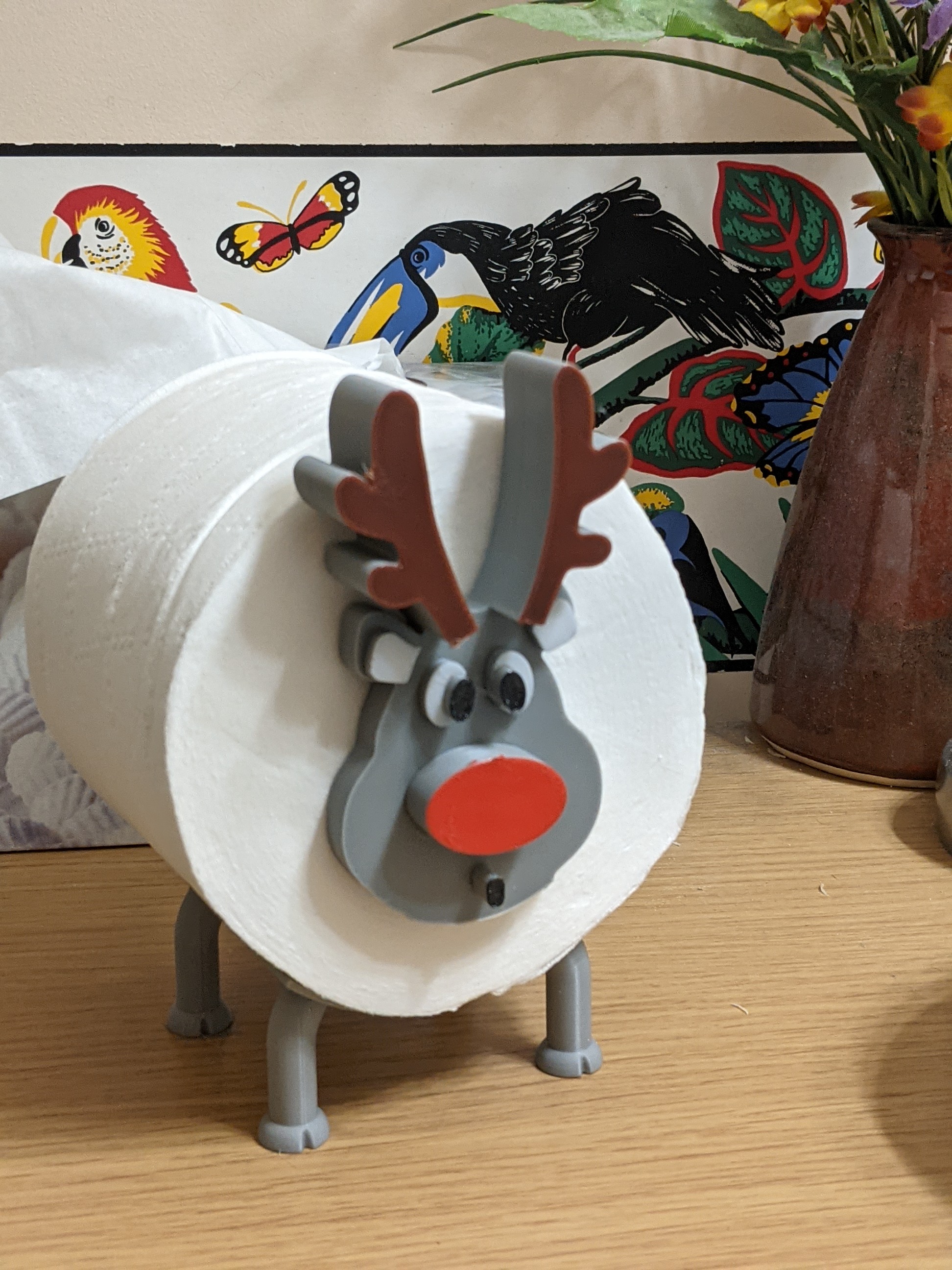 Whistling Rudolph Toilet Paper Holder Face
