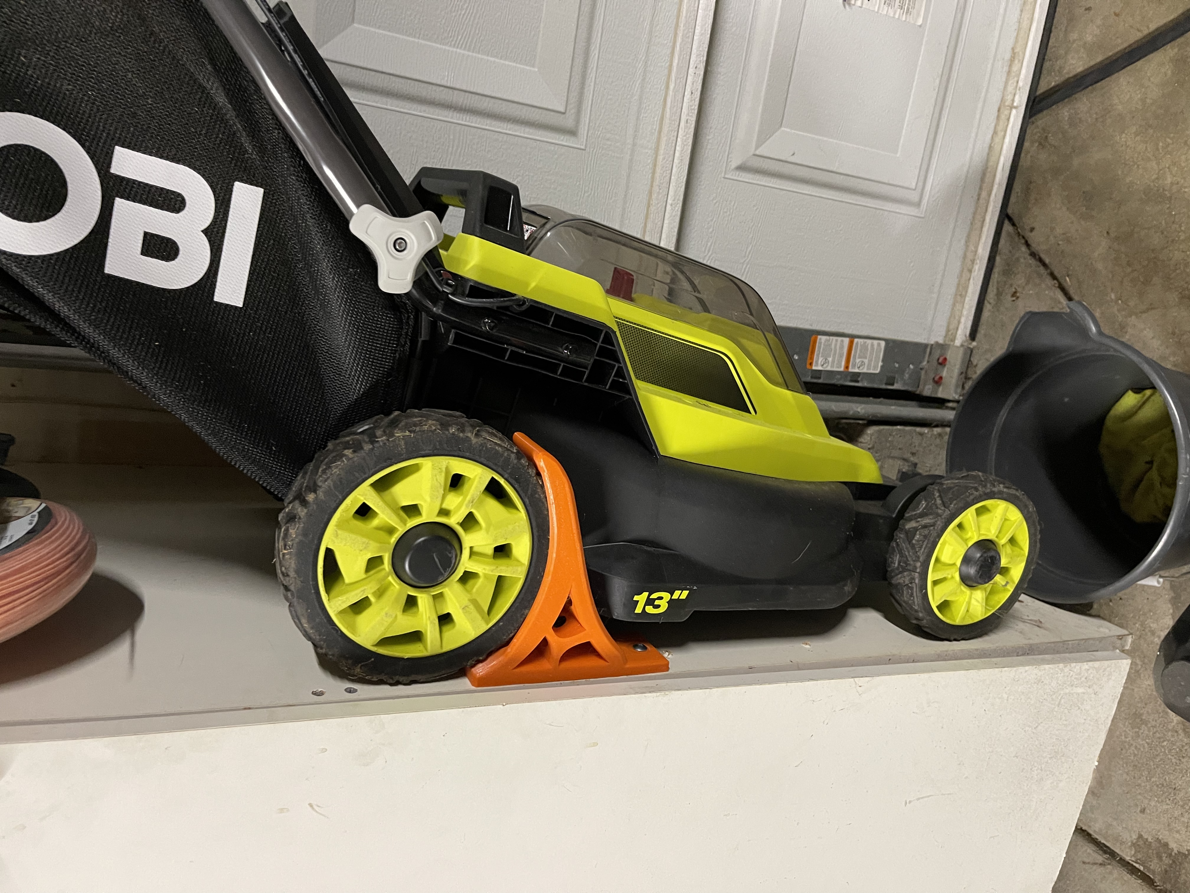 Small Lawnmower Wall Mount for 6 inch wheels