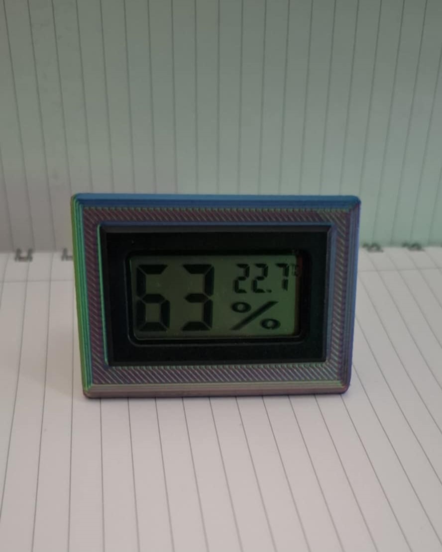 Small stand for digital thermometer and hygrometer
