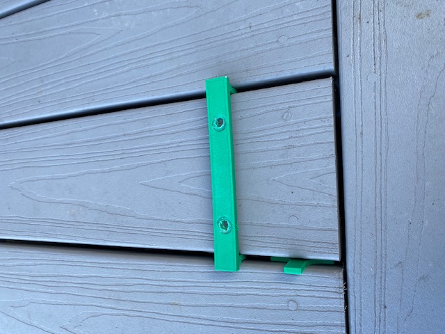 Veranda decking board guide & spacer