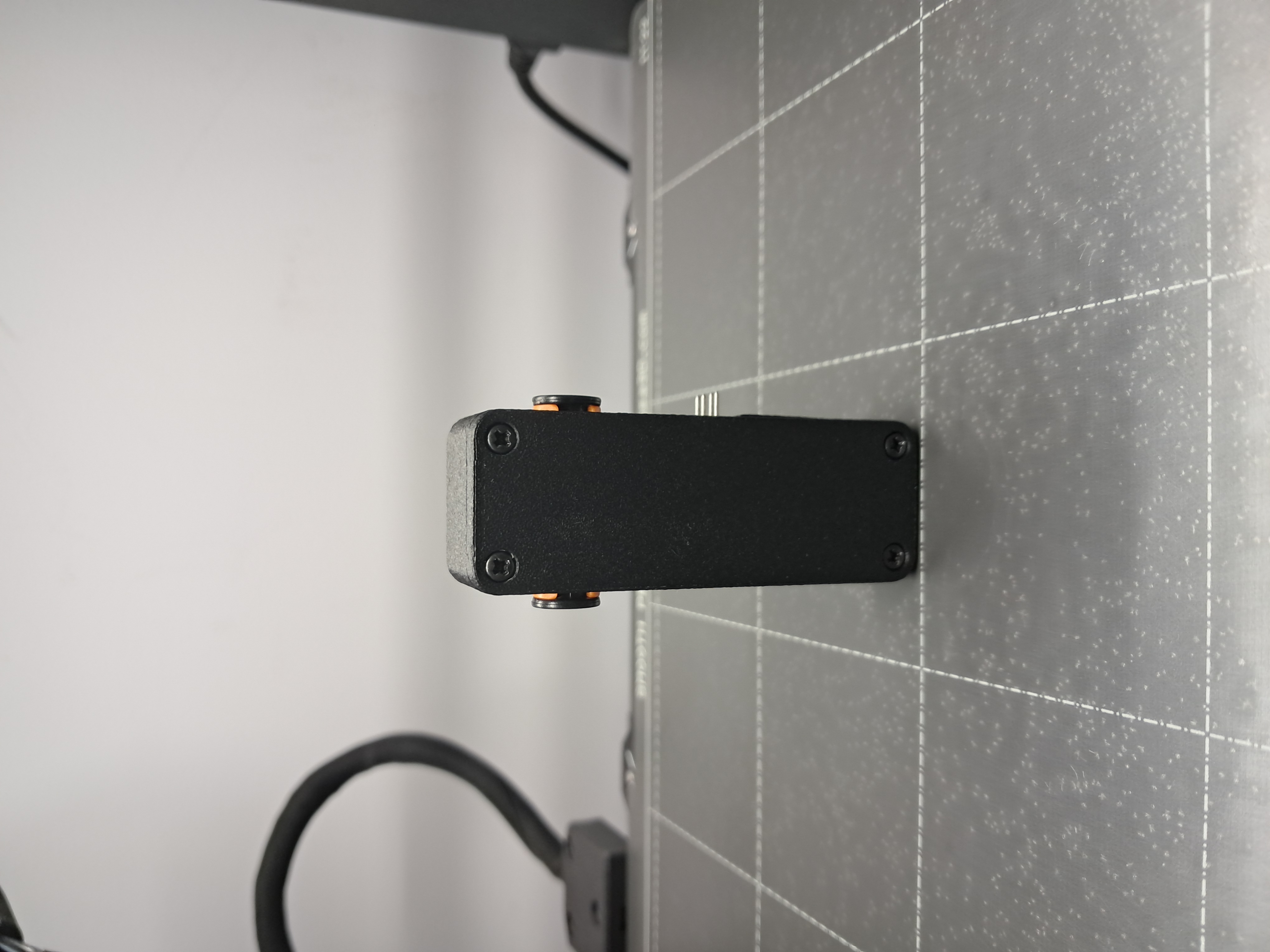 Filament width sensor with heat set inserts