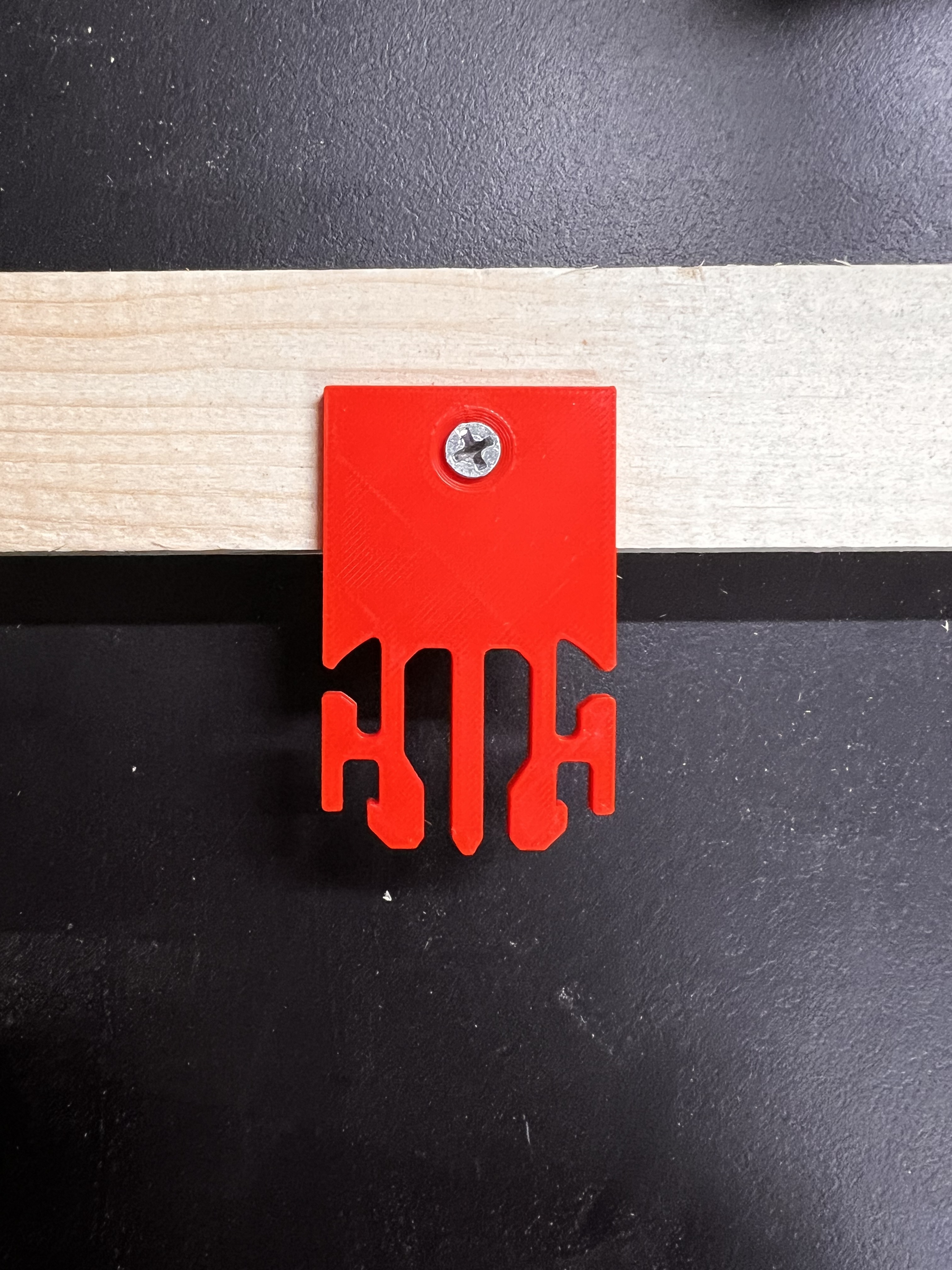 Arcade belt hanger