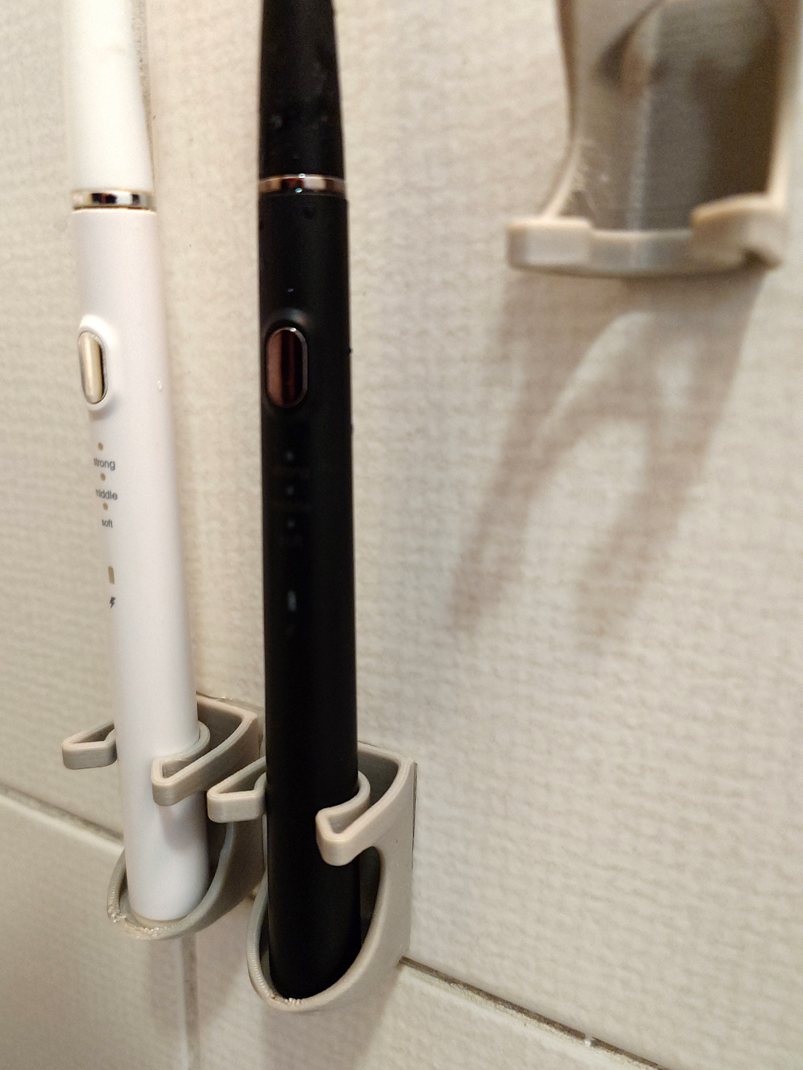 M200 electric toothbrush flex holder