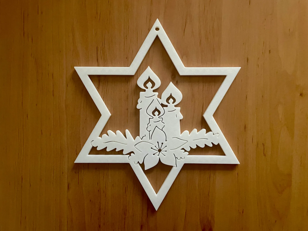 Christmas star with candles