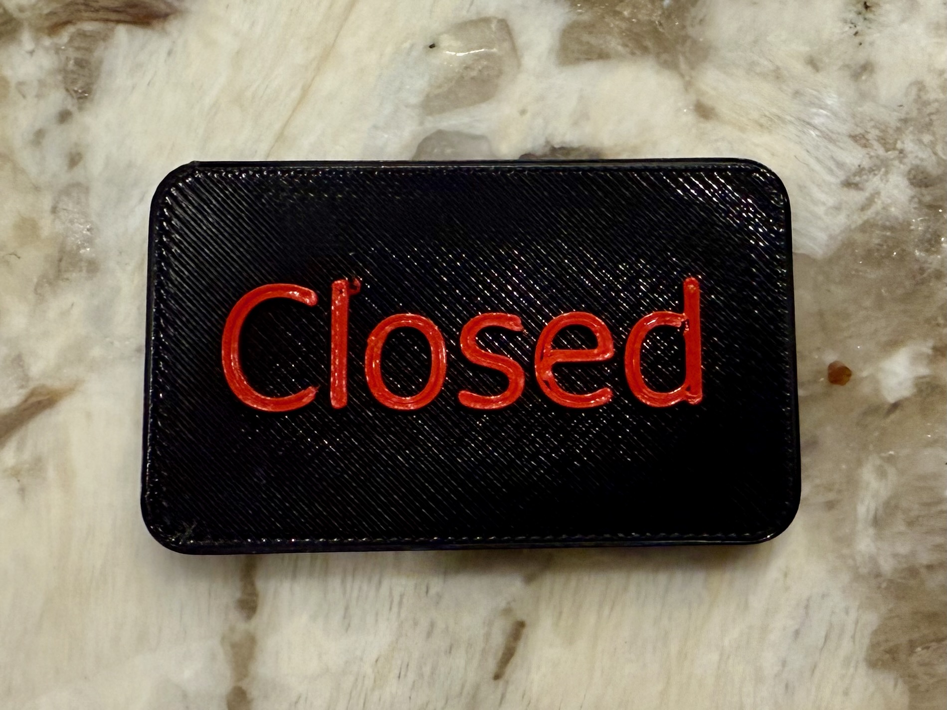 General purpose sign/tag with embedded magnets and editable text