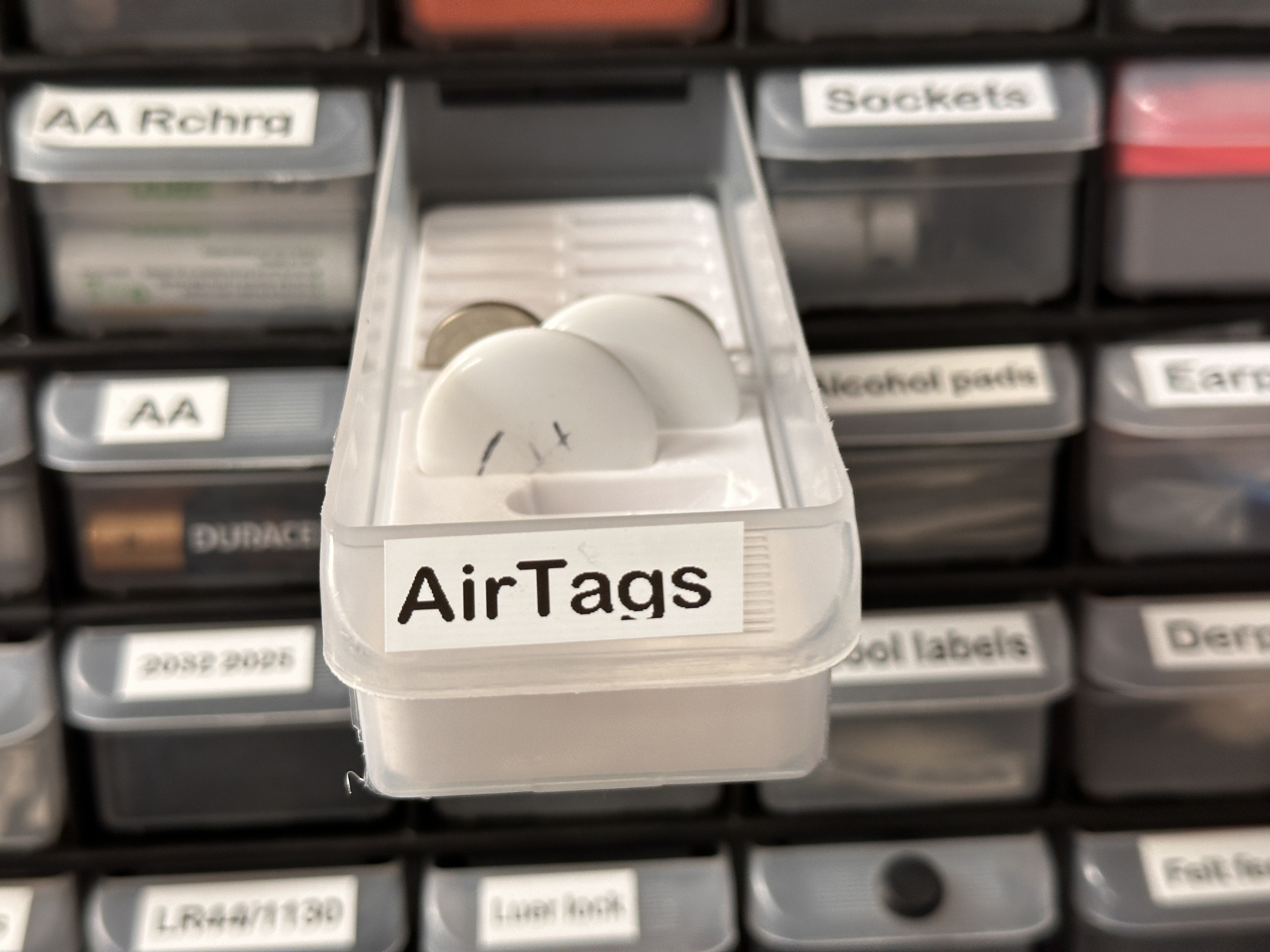 Apple AirTag and battery holder for Akro-Mils plastic drawers